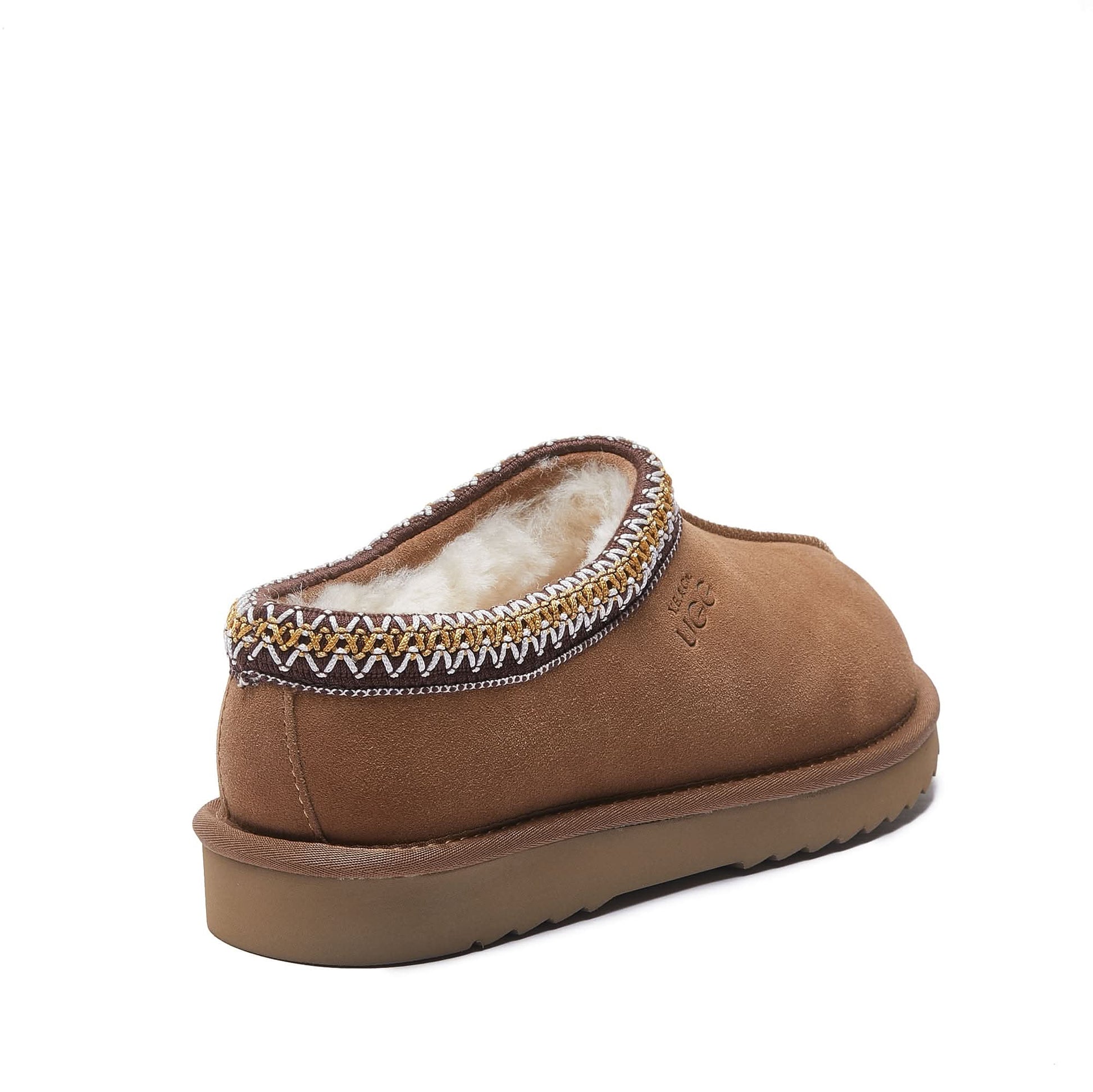 Tan suede sheepskin moccasin slipper with wool lining, rear three-quarter view. - Yellow Earth Australia
