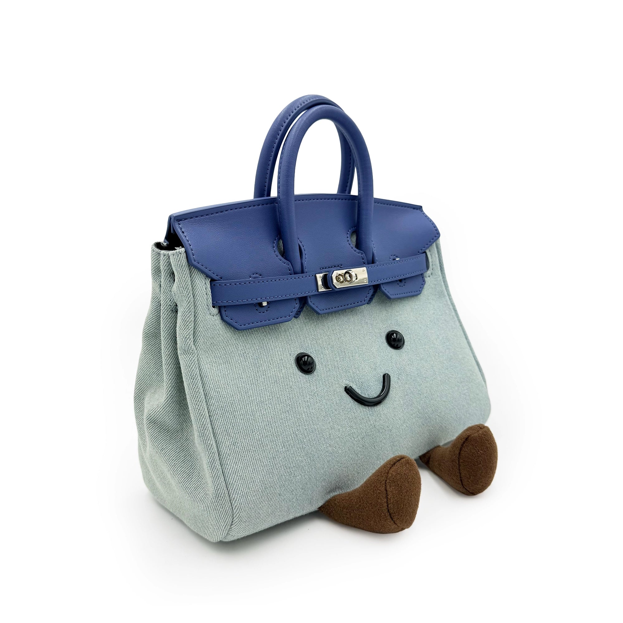 Light blue wool handbag with navy leather handles and brown feet, front view. - Yellow Earth Australia