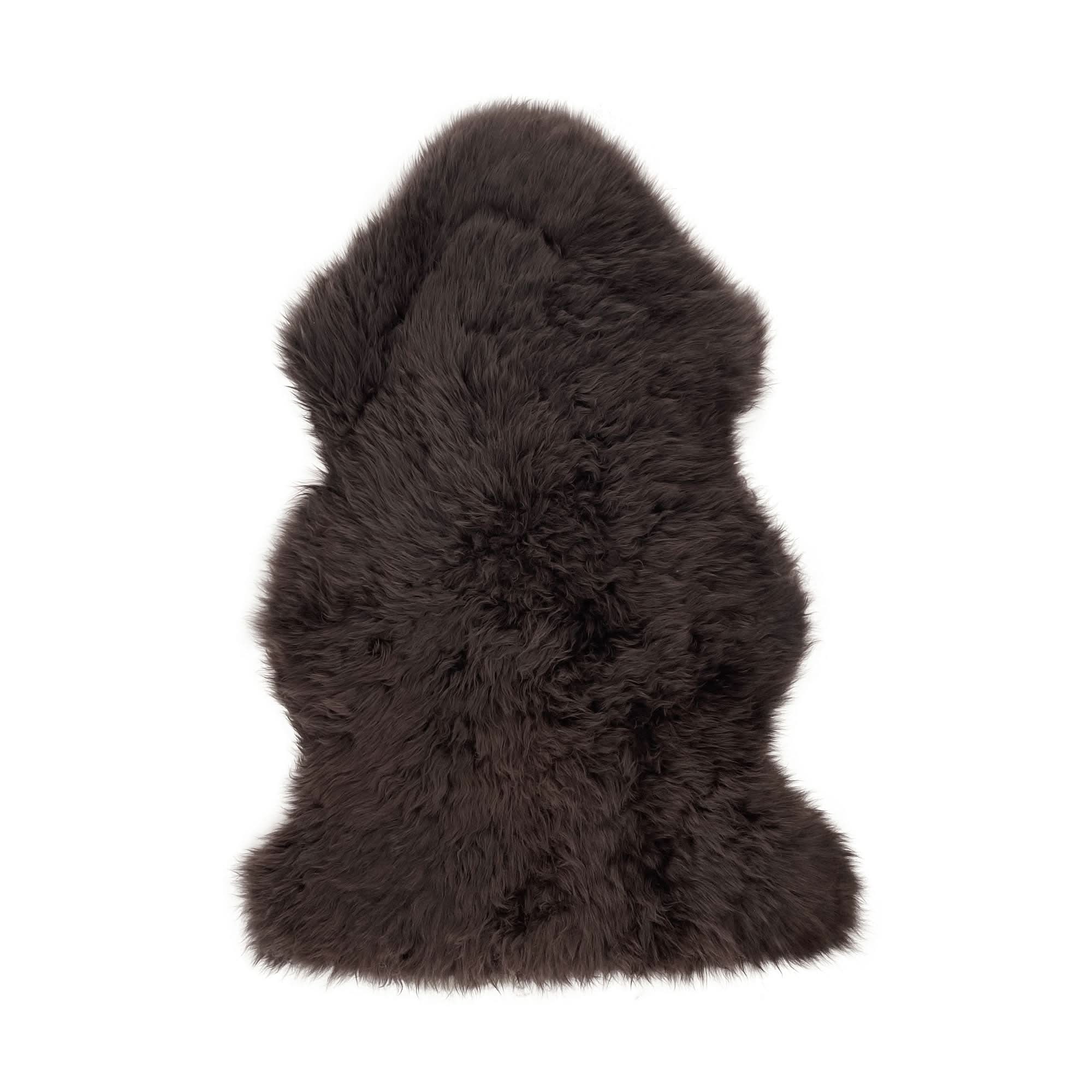 Black sheepskin rug with natural wool texture, viewed from above. - Yellow Earth Australia