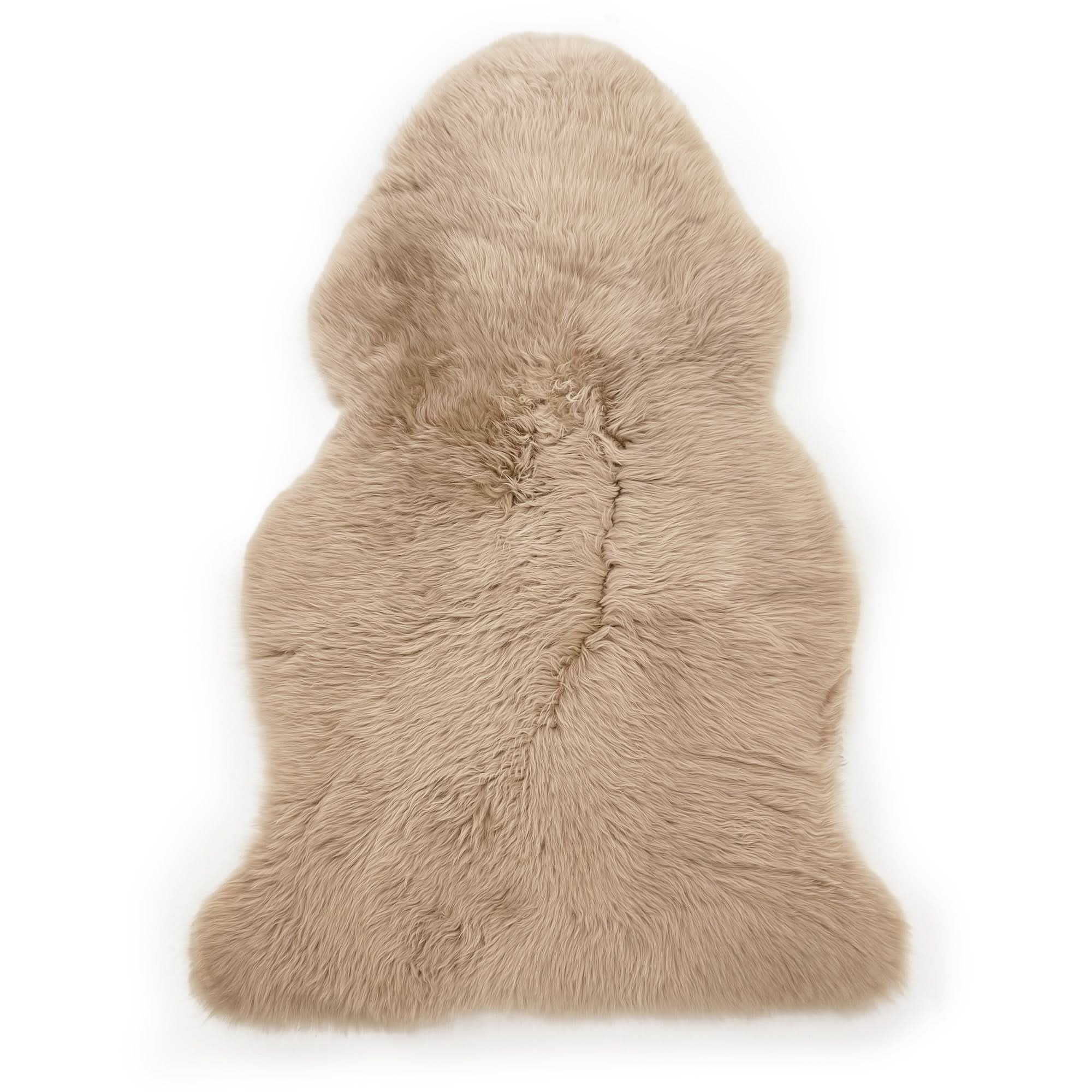 Cream sheepskin rug with natural wool texture, viewed from above on white background. - Yellow Earth Australia
