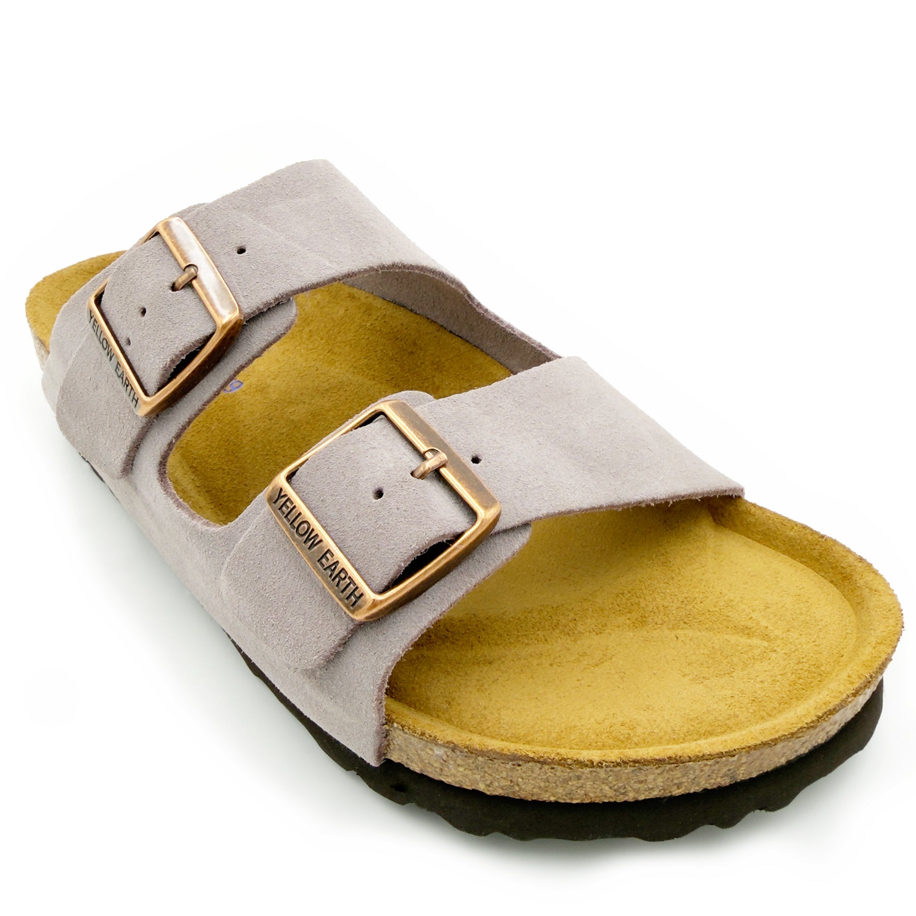 Beige suede double-buckle slide sandal with yellow wool lining, angled side view. - Yellow Earth Australia