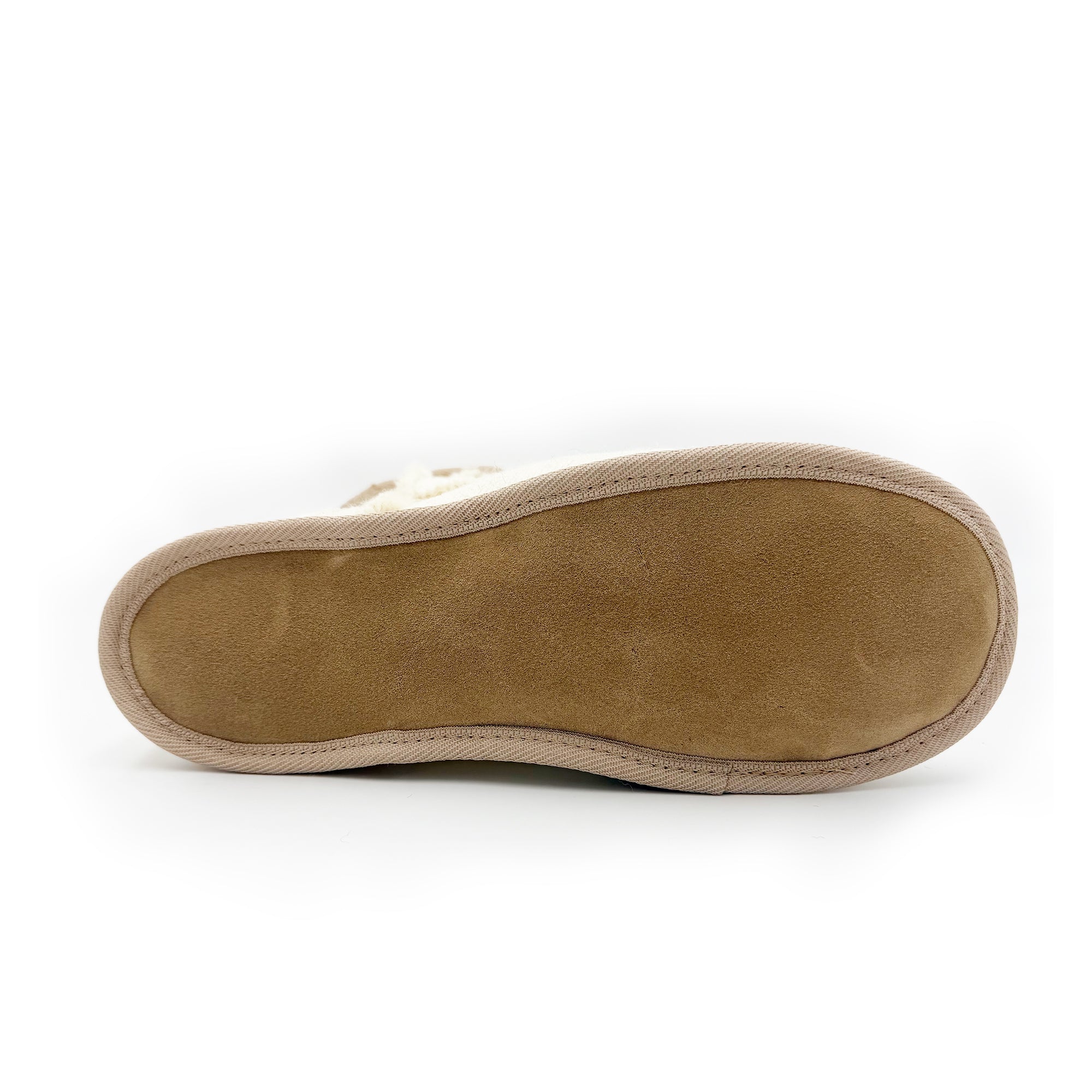 Sheepskin slipper sole showing tan suede lining and cream textile upper from above. - Yellow Earth Australia