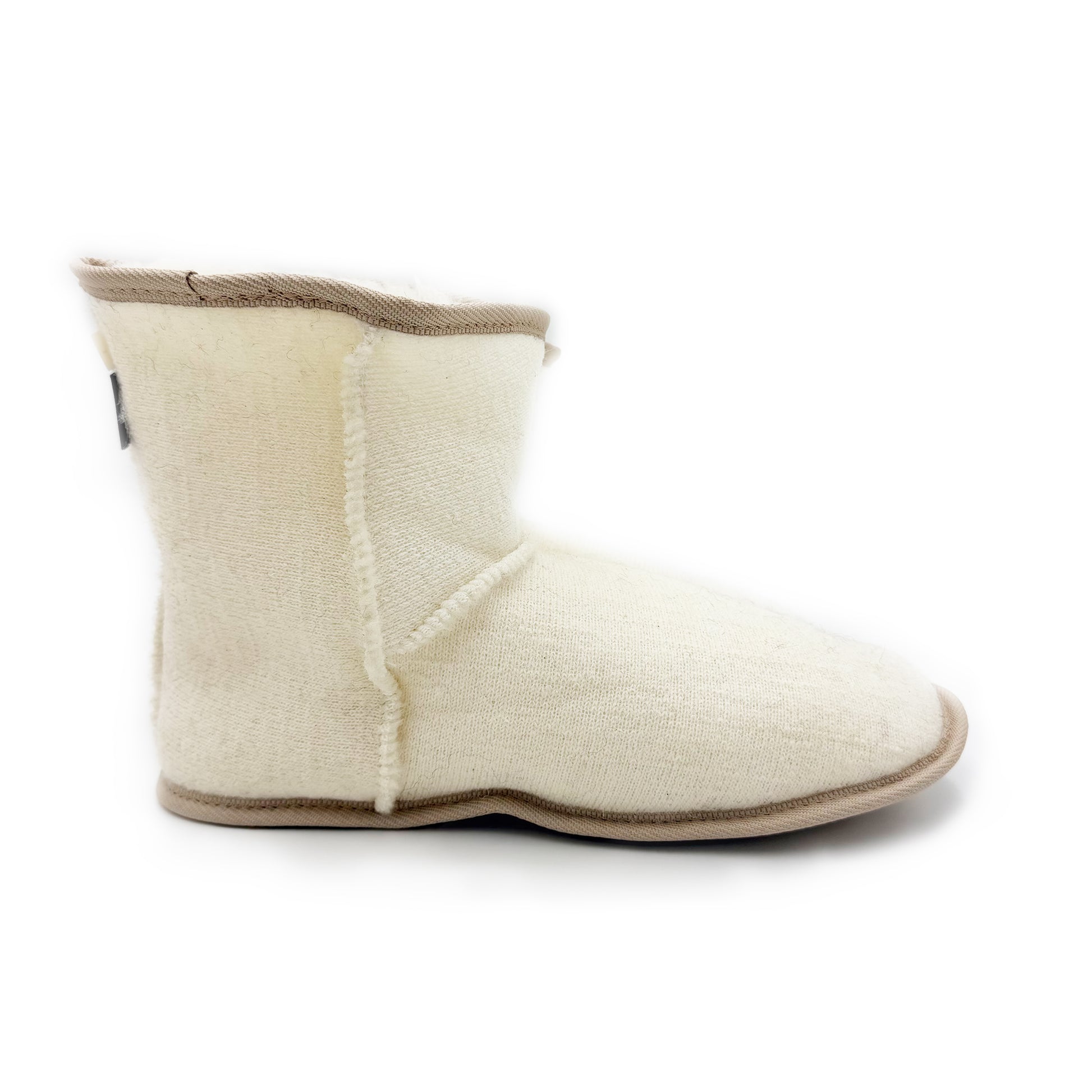 Cream wool sheepskin boot slipper shown from the side angle. - Yellow Earth Australia