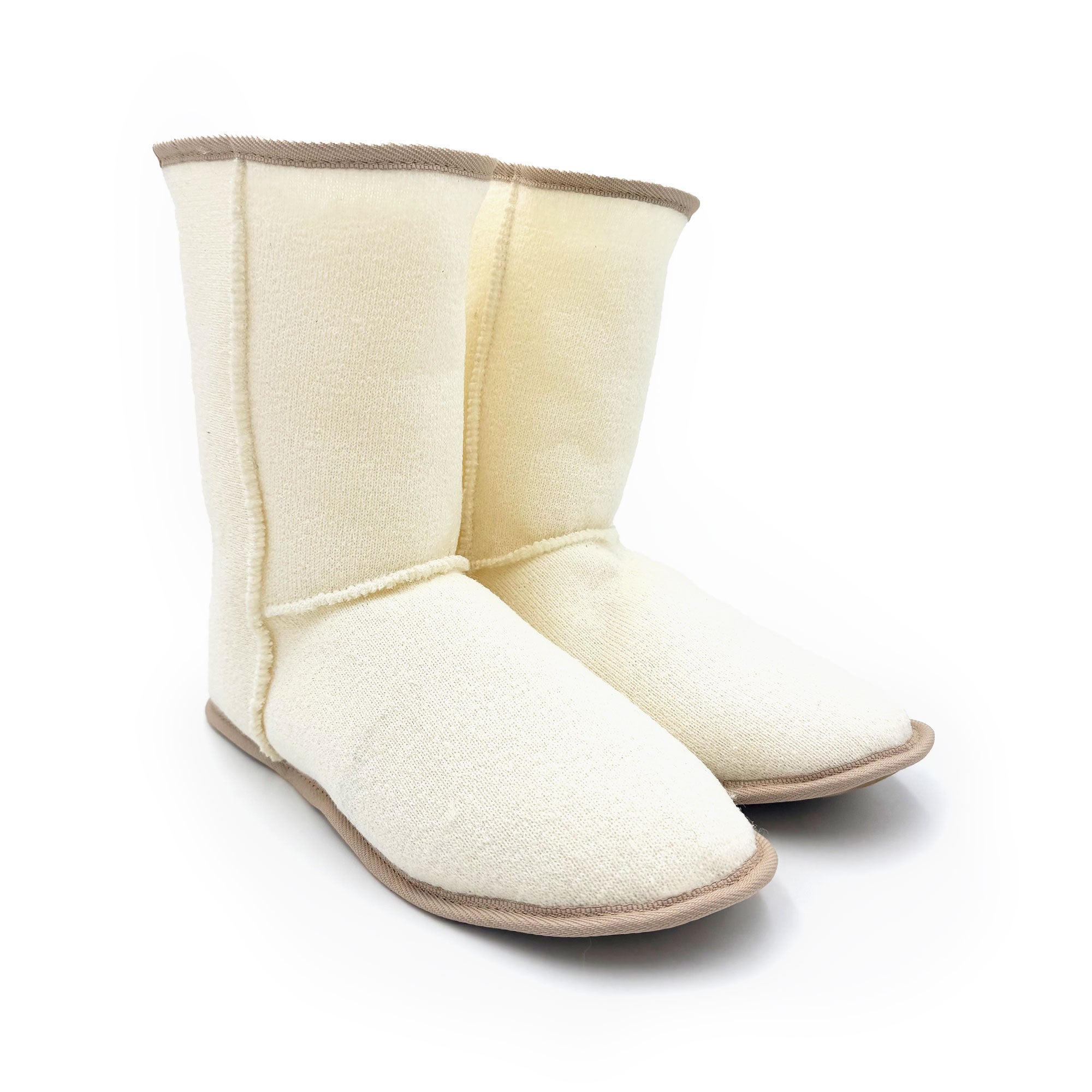 Cream sheepskin boots with wool lining shown from three-quarter front view. - Yellow Earth Australia