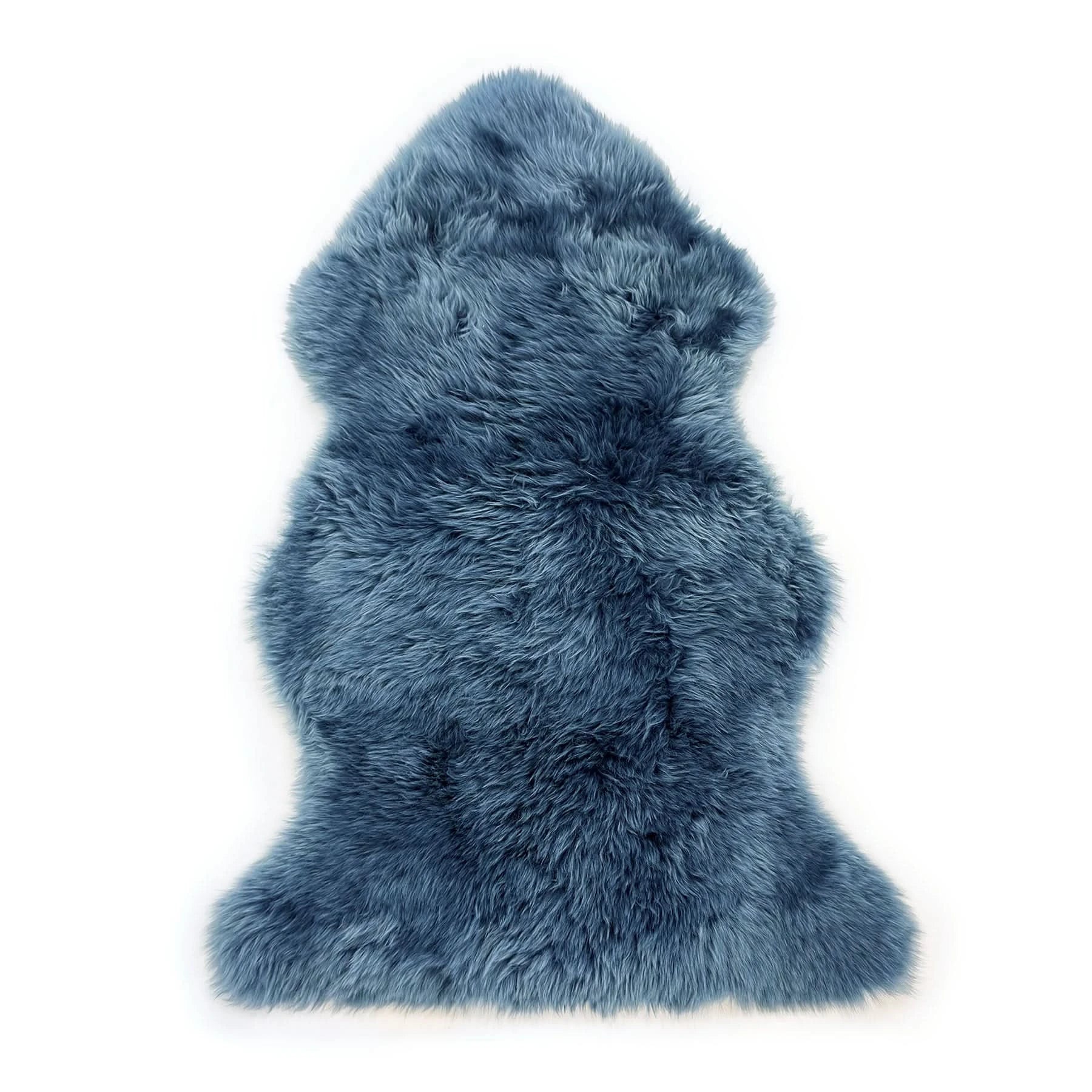 Blue sheepskin rug with soft wool texture, top-down view on white background. - Yellow Earth Australia