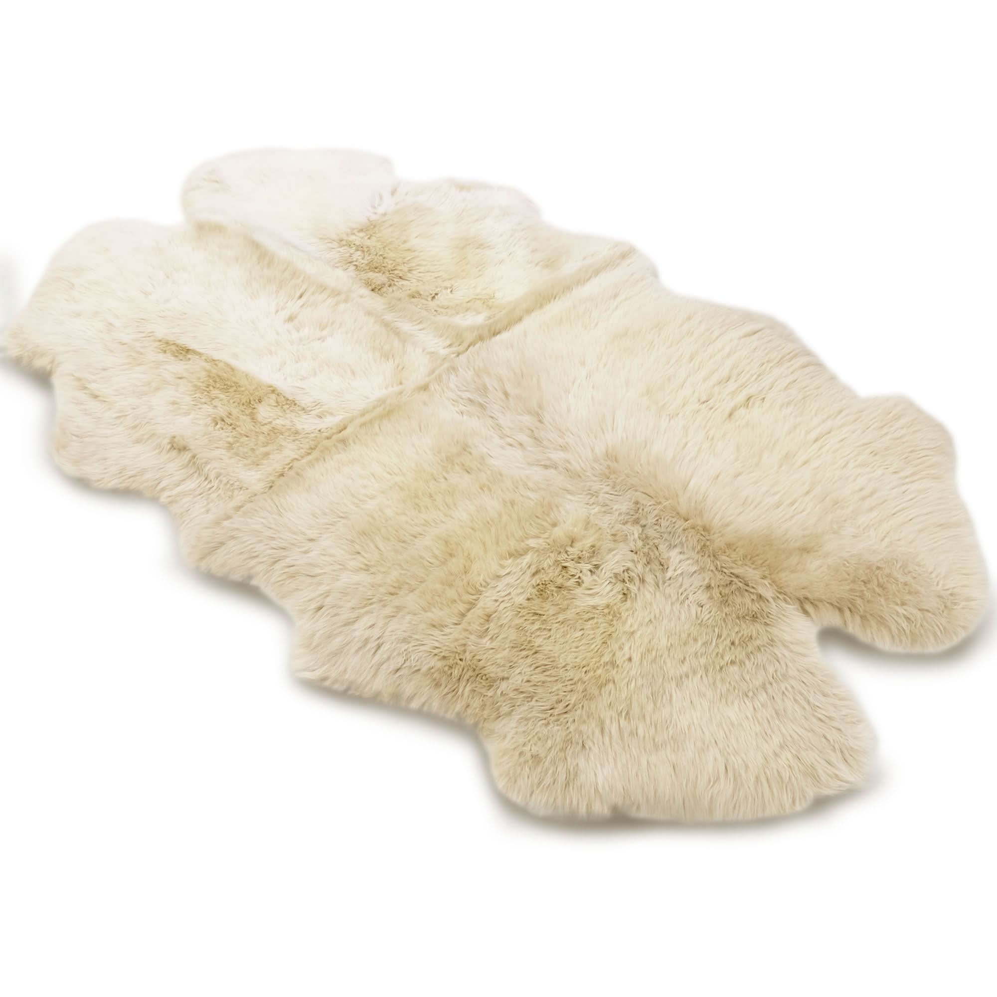 Luxurious cream sheepskin rug with soft wool pile viewed from above on white background. - Yellow Earth Australia