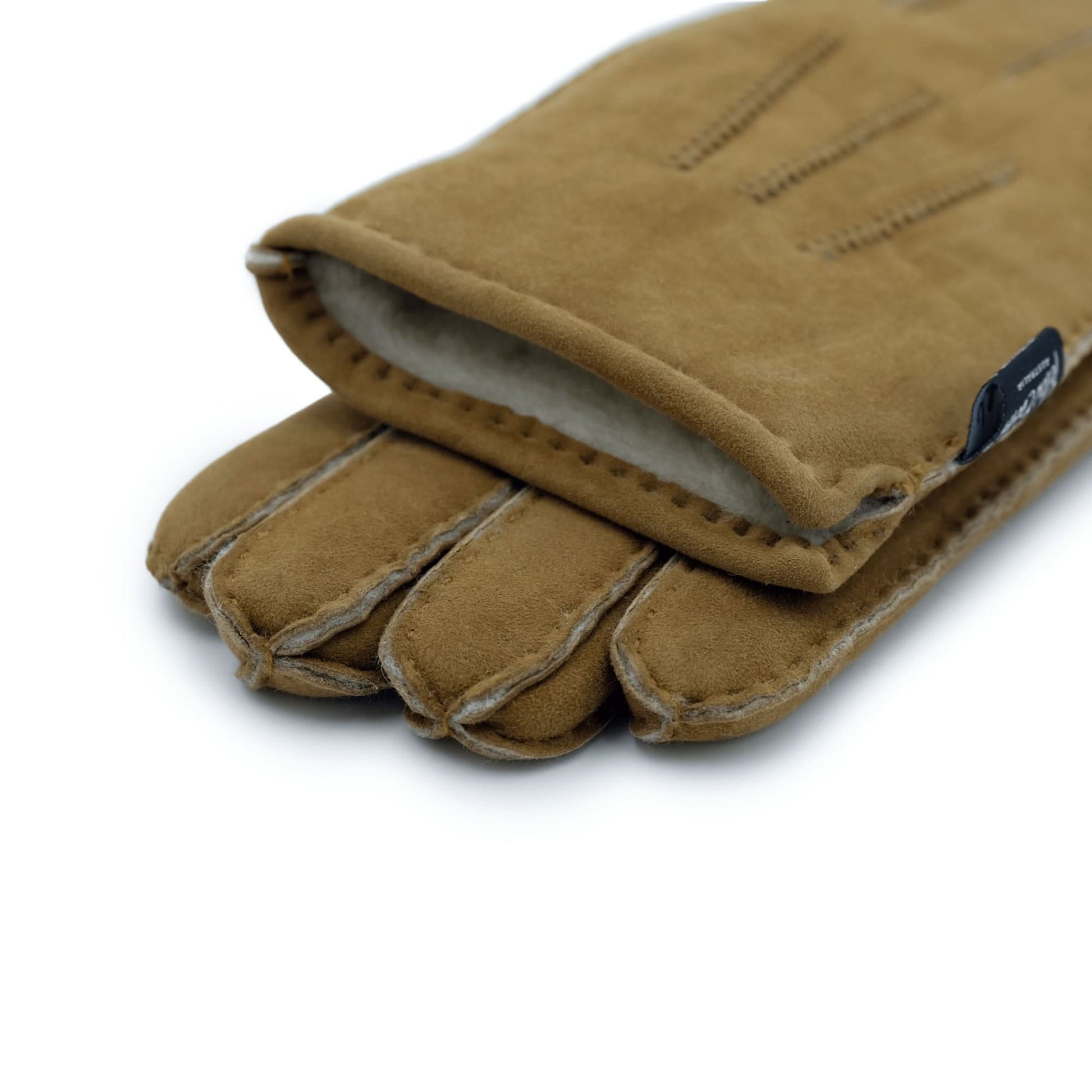 Tan suede sheepskin gloves with wool lining, displayed from above showing stitched finger detail. - Yellow Earth Australia
