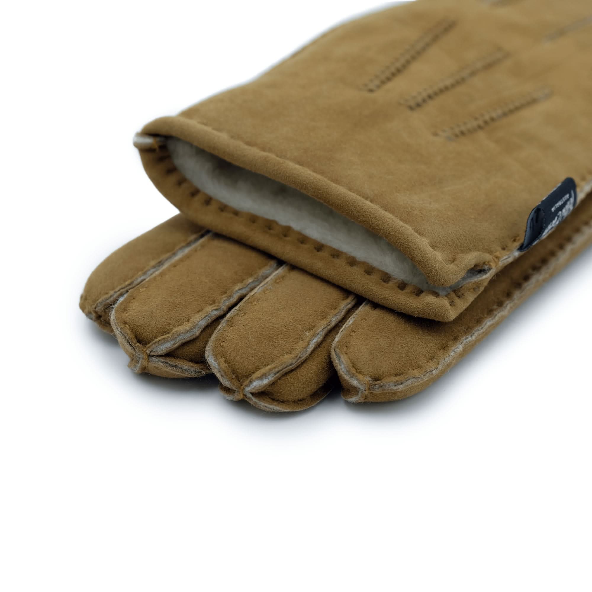 Tan suede sheepskin gloves with wool lining, displayed from above showing stitched finger detail. - Yellow Earth Australia