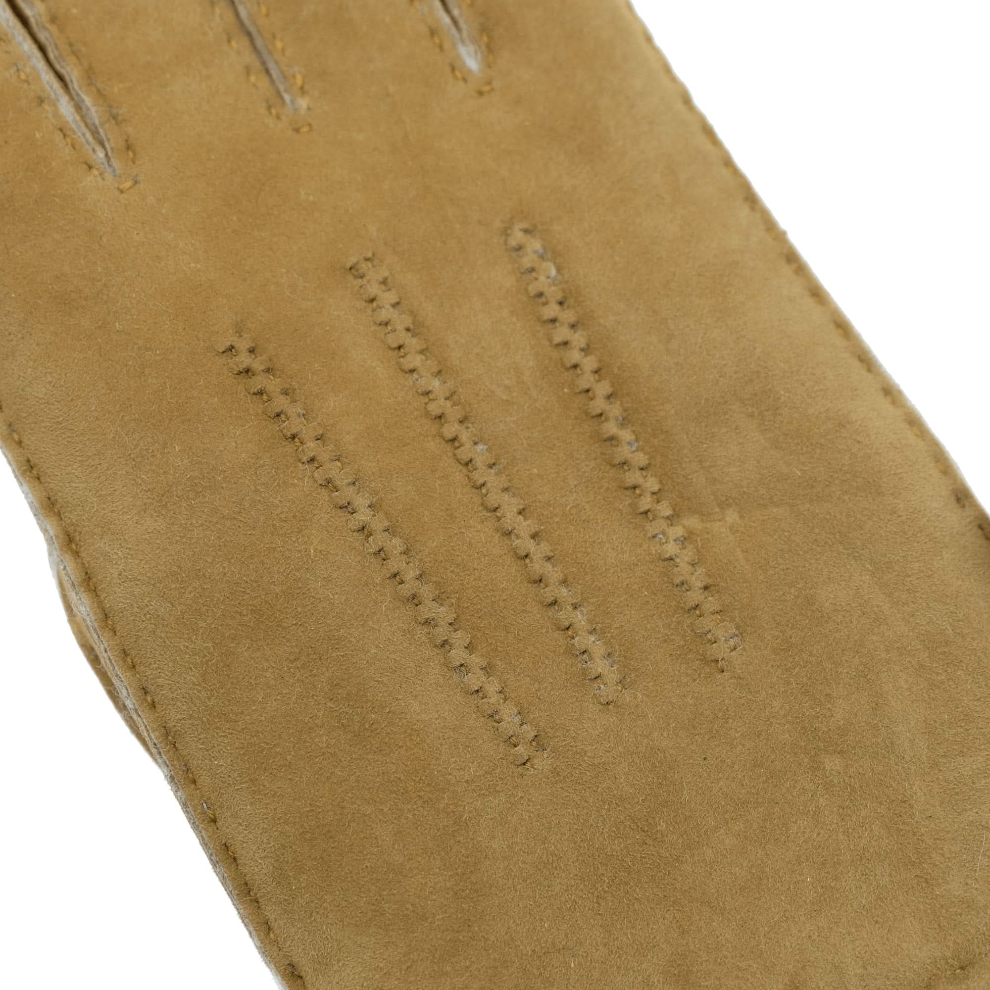 Tan suede sheepskin glove showing stitched seams detail from side angle. - Yellow Earth Australia
