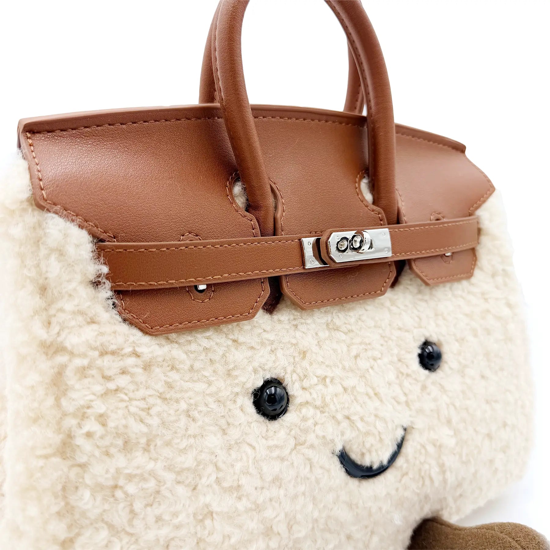 Cream sheepskin handbag with tan leather handles and cute face design, front view. - Yellow Earth Australia