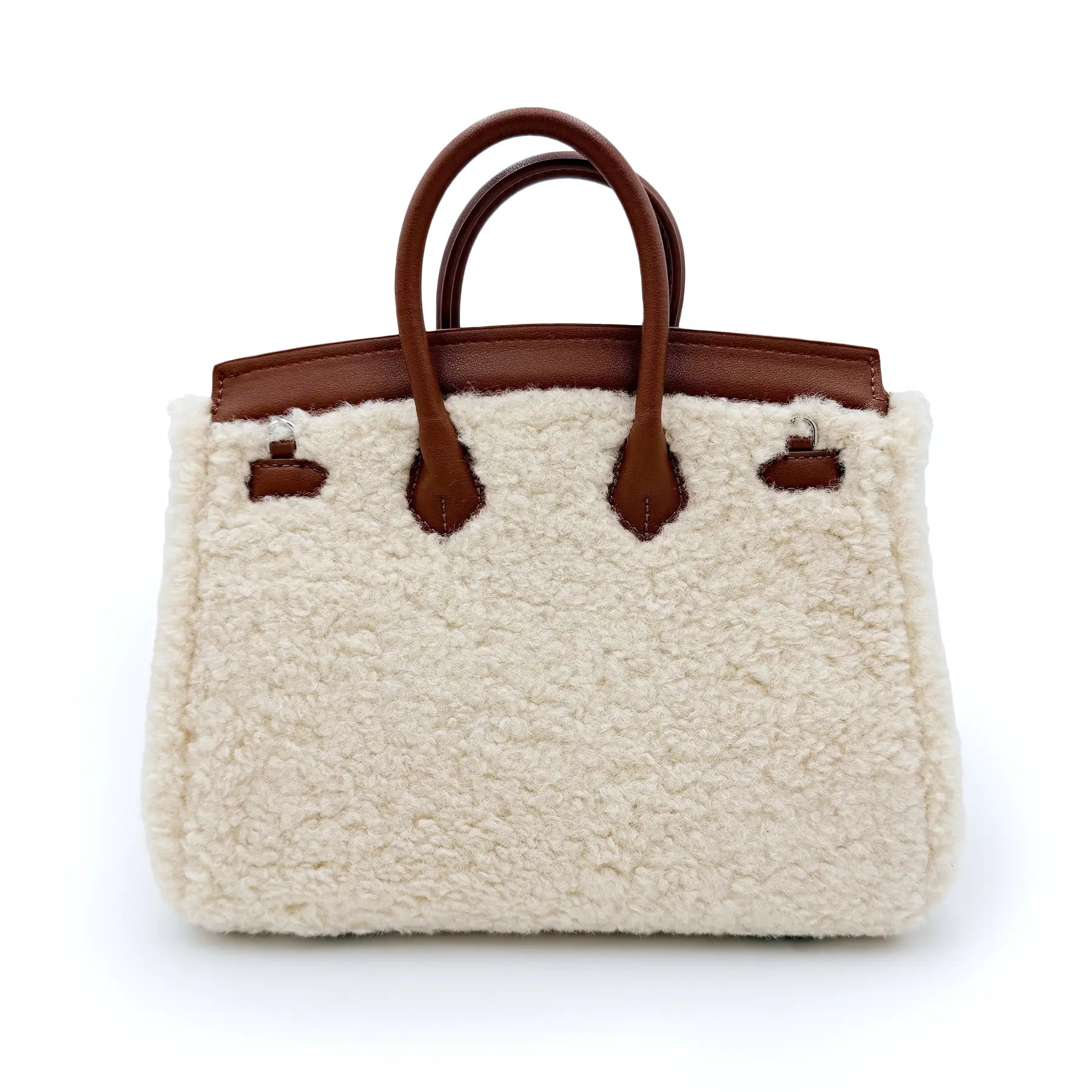 Cream sheepskin handbag with brown leather handles, front view. - Yellow Earth Australia