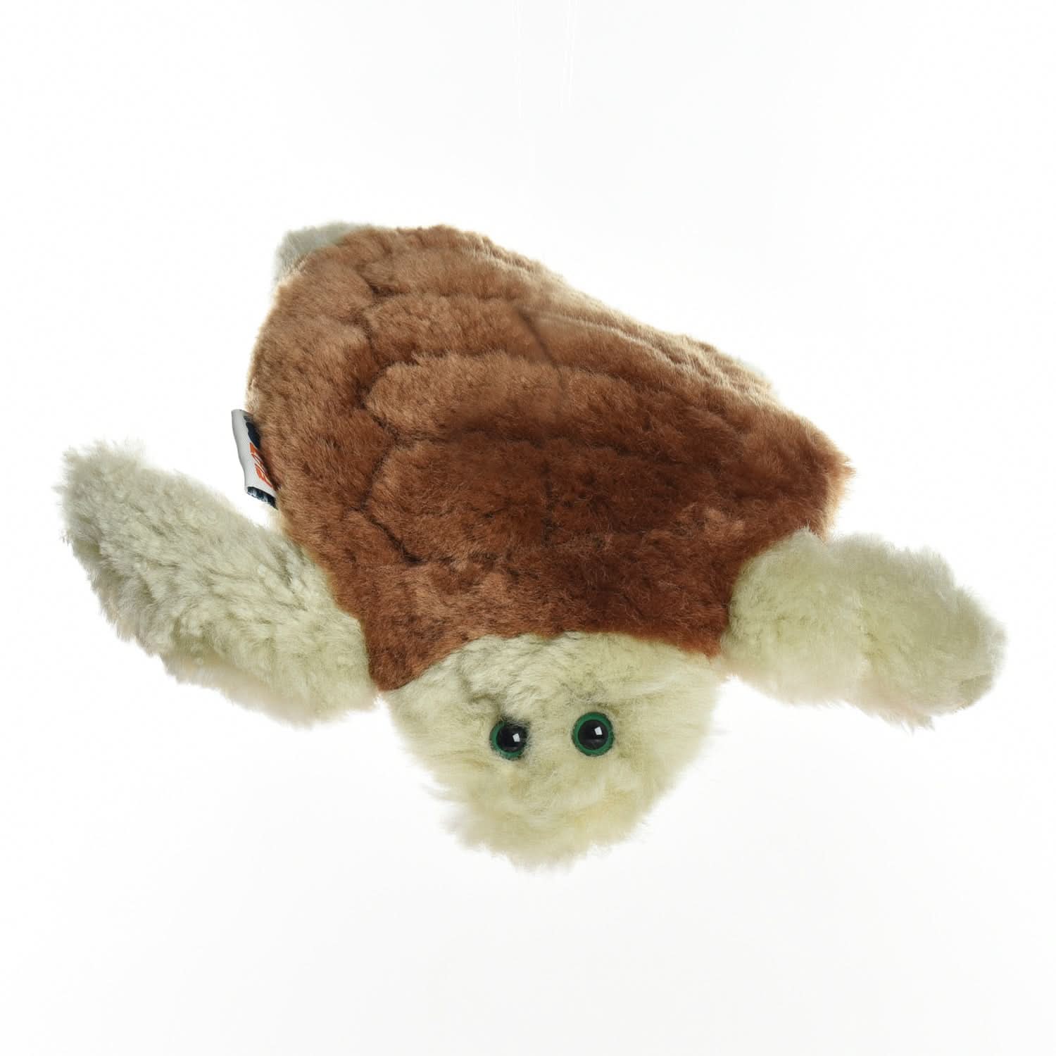 Soft sheepskin toy turtle with brown shell and cream-colored head and flippers, top view. - Yellow Earth Australia