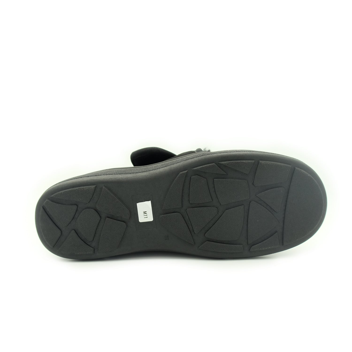 Black sheepskin boot sole with geometric tread pattern, bottom view. - Yellow Earth Australia