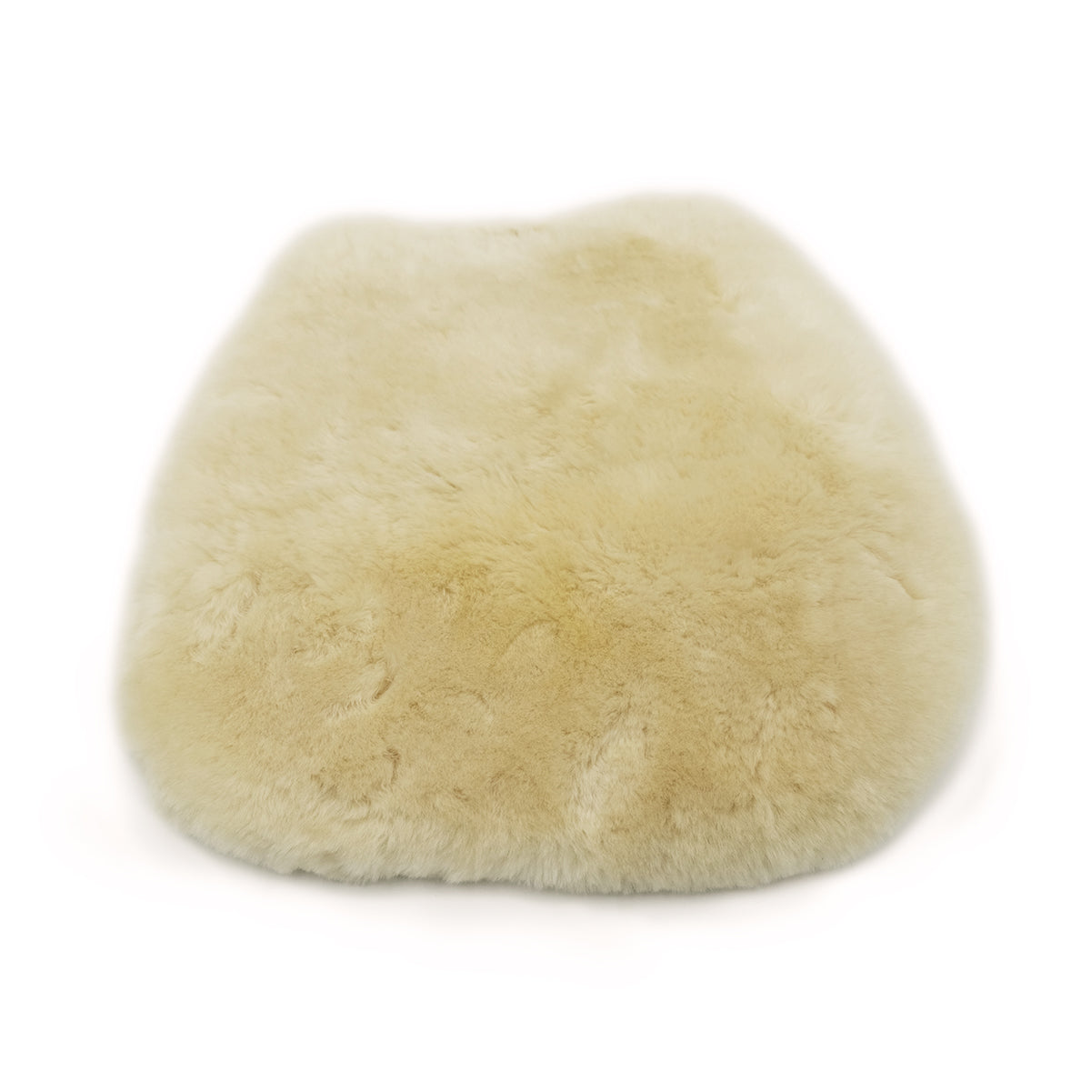Cream sheepskin seat pad with soft wool texture, top view. - Yellow Earth Australia