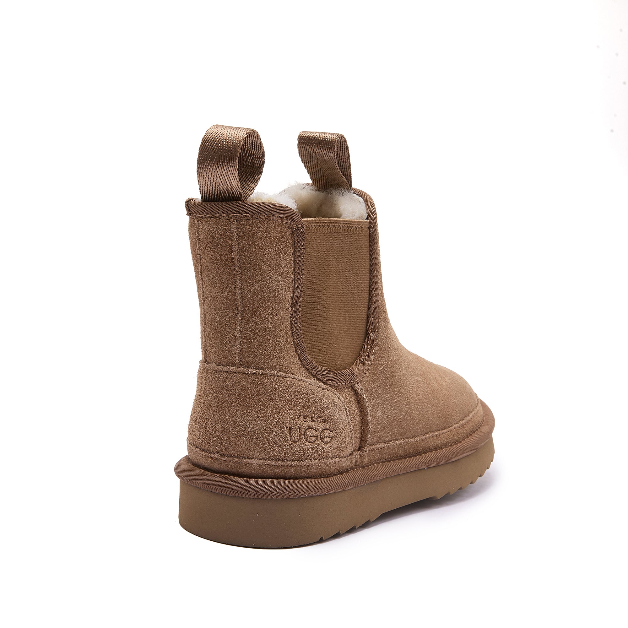 Tan sheepskin pull-on boot with wool lining, rear three-quarter view. - Yellow Earth Australia