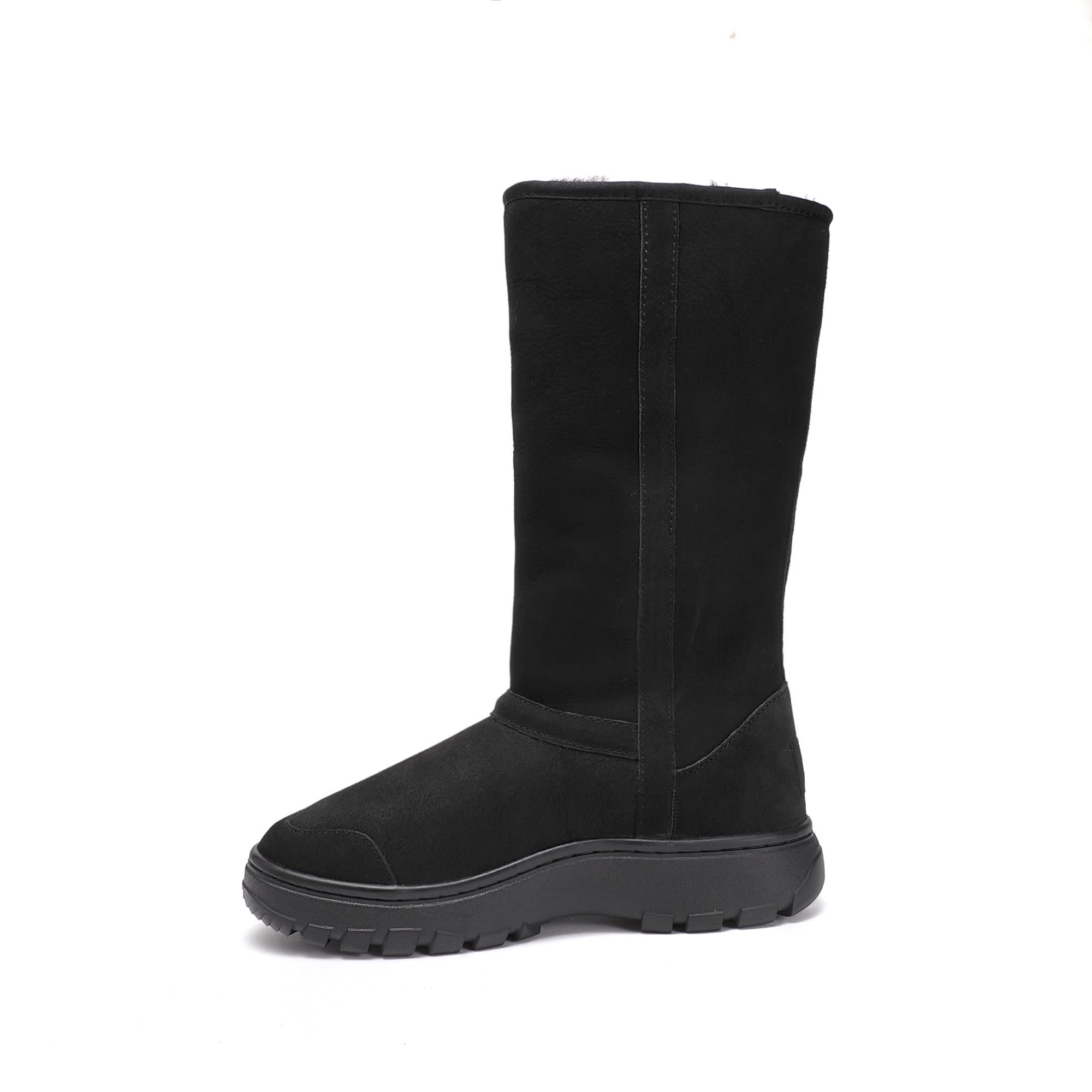 Black suede sheepskin mid-calf boot with chunky lug sole, side view. - Yellow Earth Australia