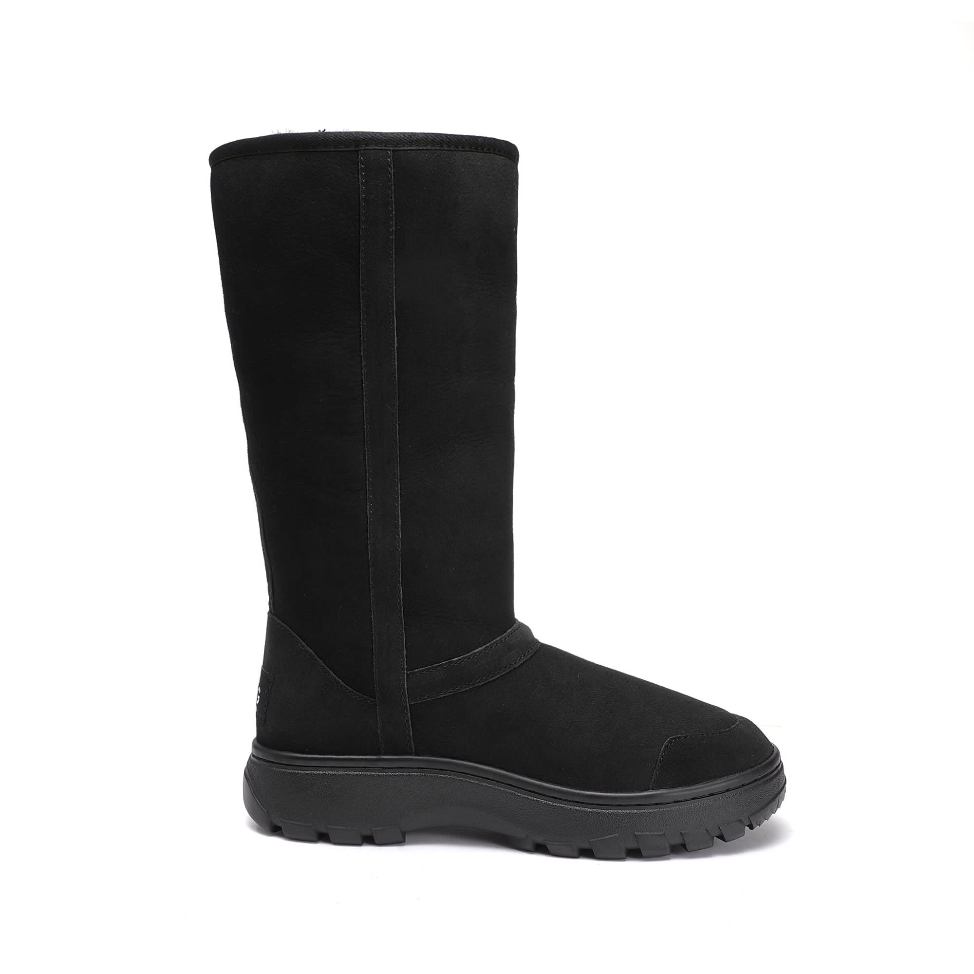 Black sheepskin tall boot with textured lug sole, side view. - Yellow Earth Australia