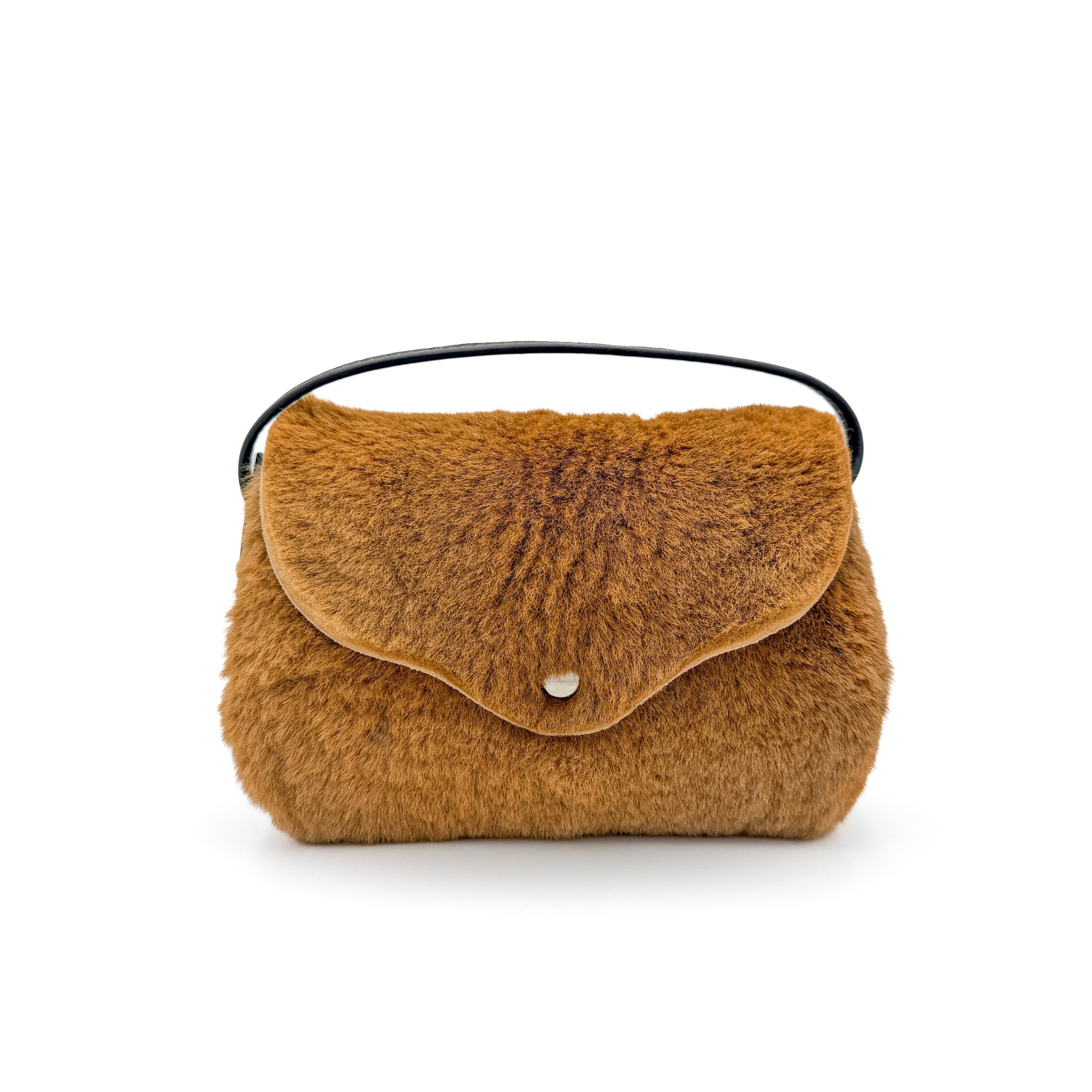 Kangaroo fur flap over bag with a black leather handle and button closure