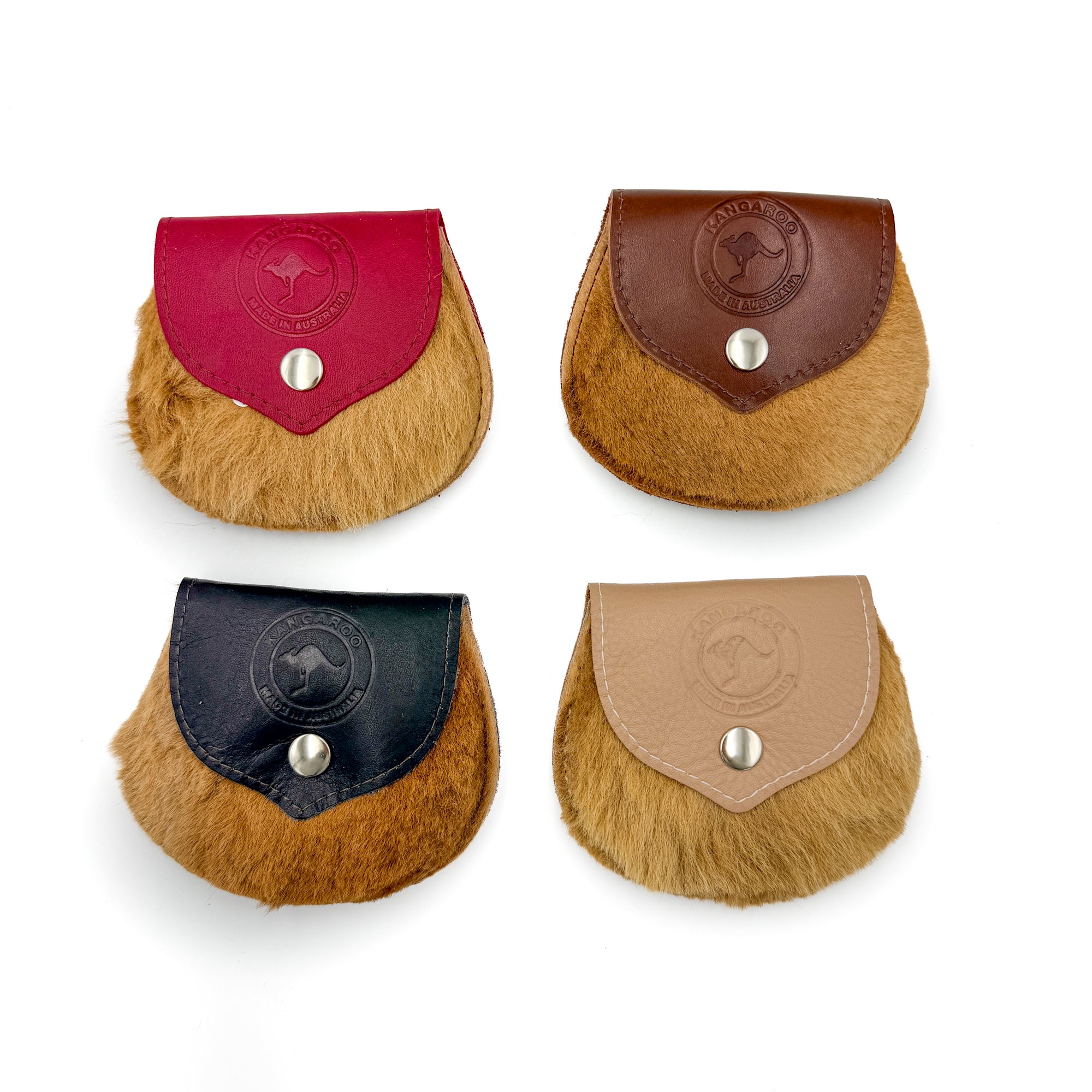 Four kangaroo fur flapover purses side by side — red, dark brown, black, and tan colourways