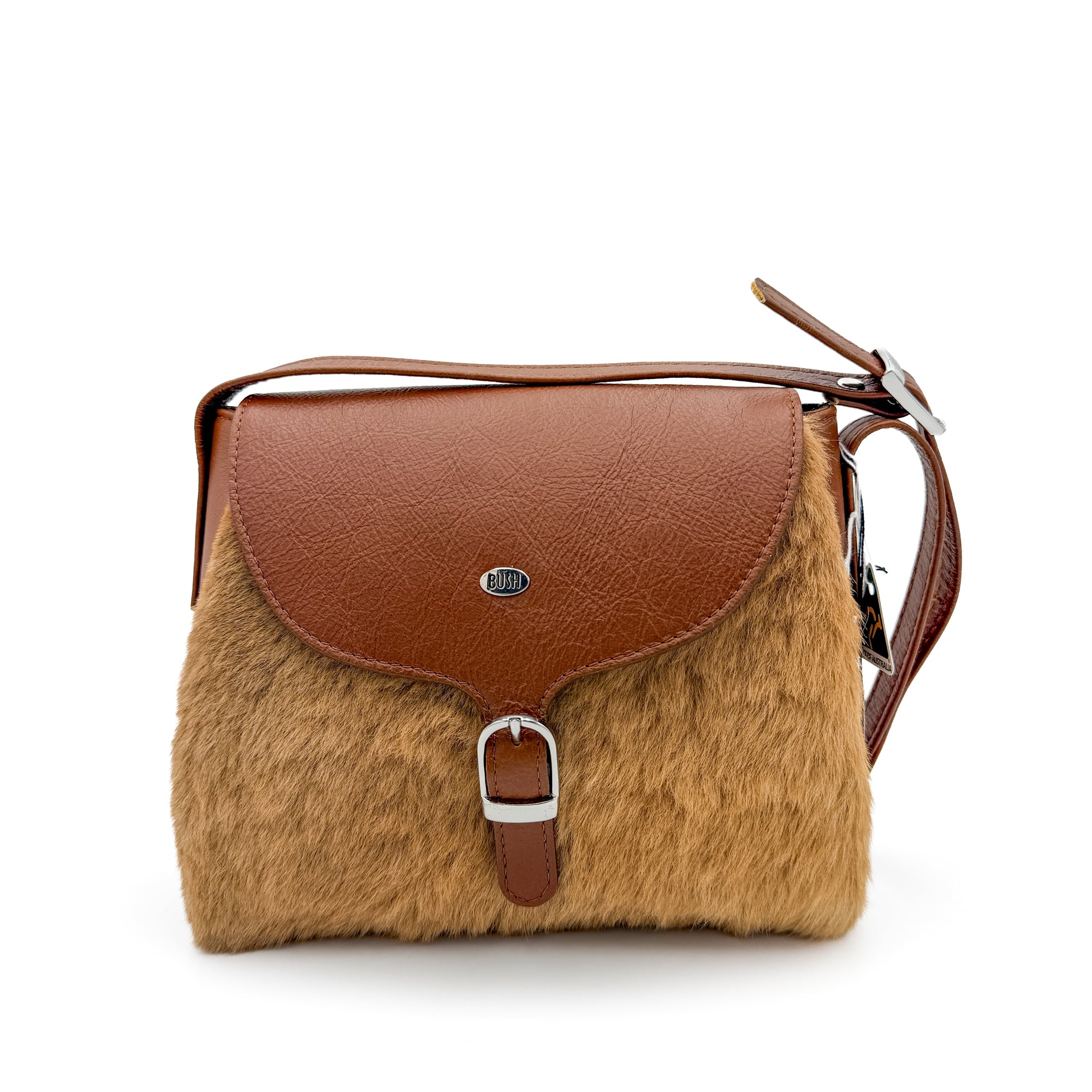 Kangaroo fur postie bag with a tan leather flap, magnetic buckle, and crossbody strap
