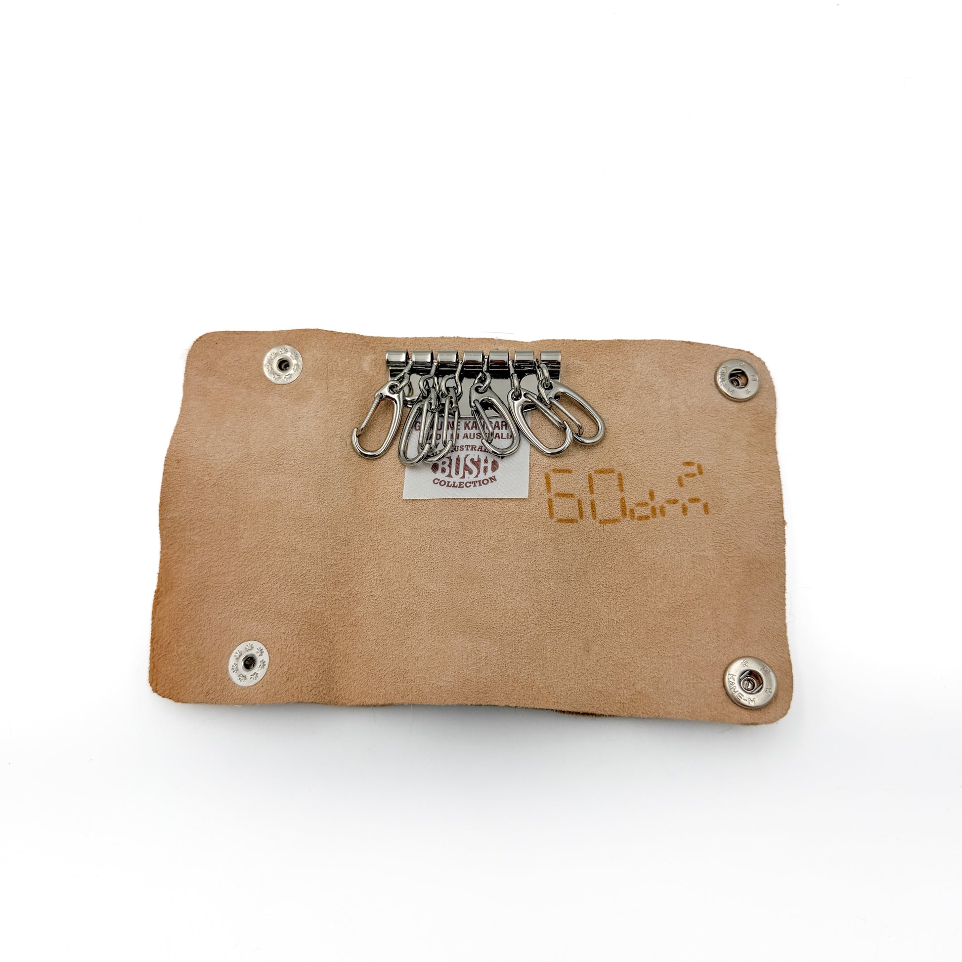 Kangaroo leather keycase open, showing 6 key hooks and the Australian Bush Collection tag