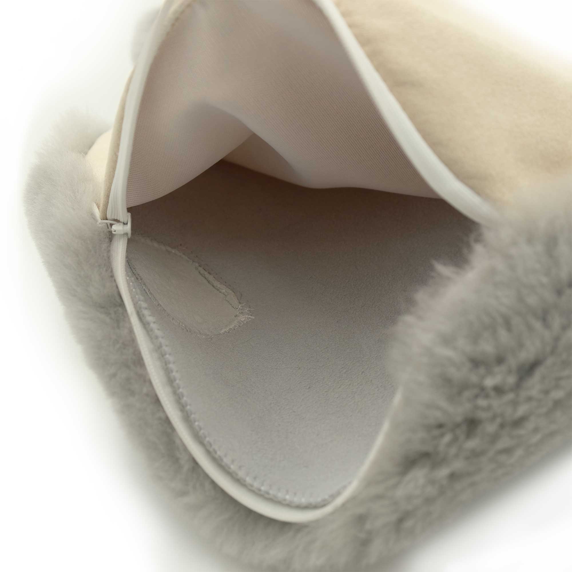 Cream sheepskin slipper interior view showing soft wool lining and white zipper. - Yellow Earth Australia