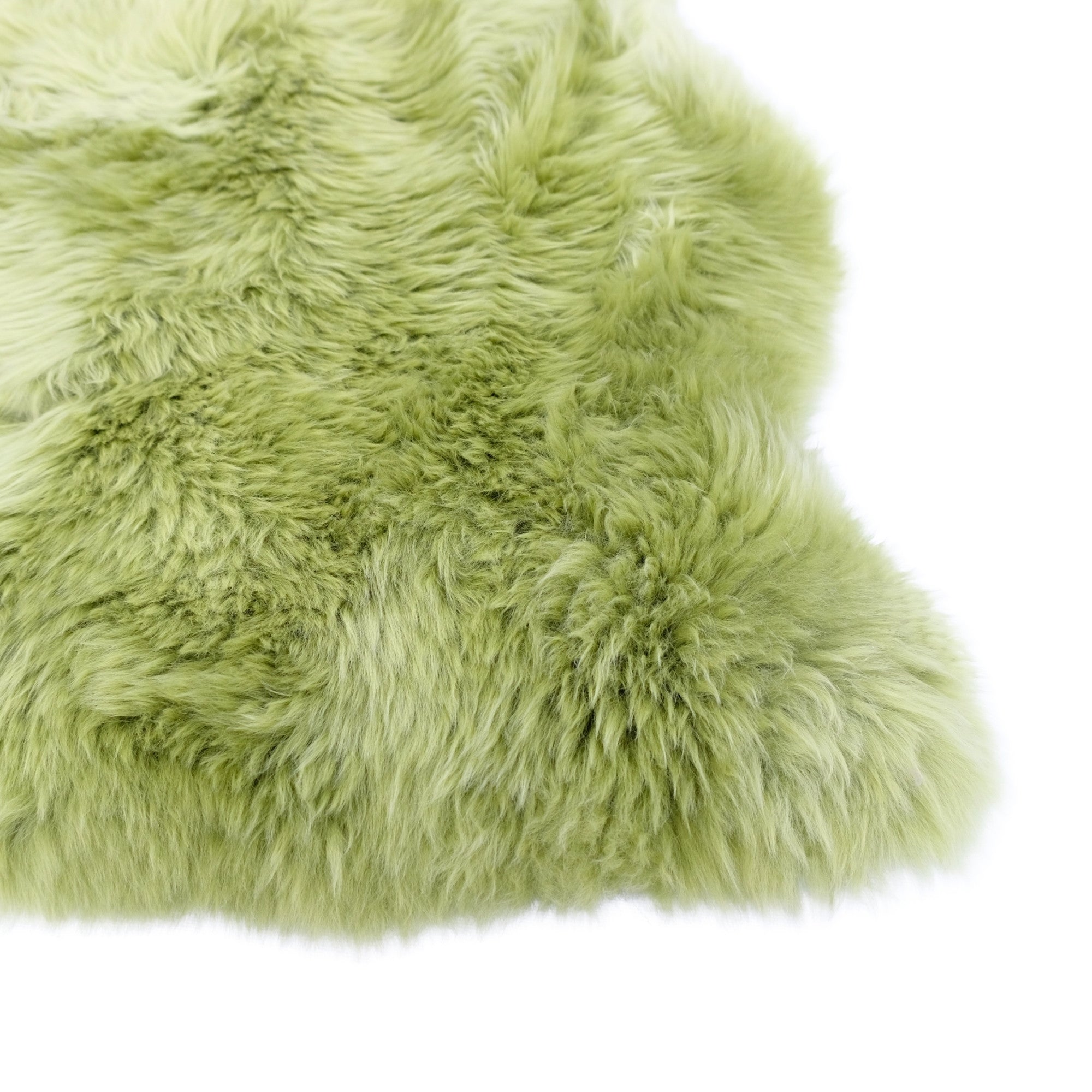 Lime green sheepskin rug with long fluffy wool pile, top-down view. - Yellow Earth Australia