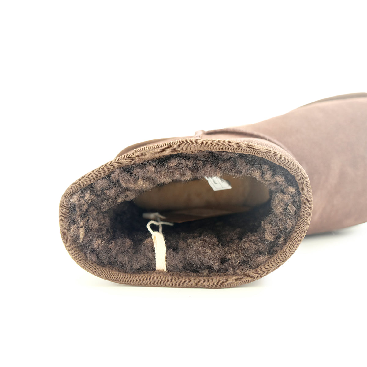 Beige sheepskin boot with dark wool lining, interior view. - Yellow Earth Australia