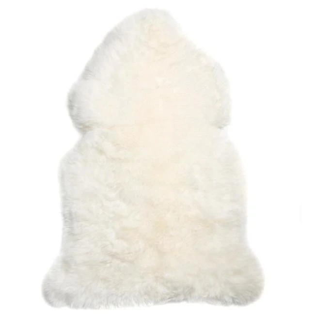 White sheepskin rug with fluffy wool texture, front view on white background. - Yellow Earth Australia