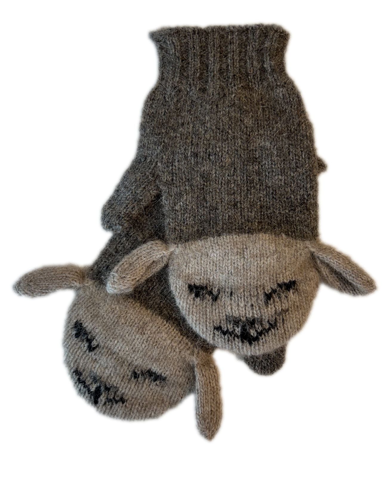 A pair of mittens shaped like sheep heads, featuring a dark brown knit body and a light beige knit face with black embroidered eyes and mouth details, shown against a plain white background.