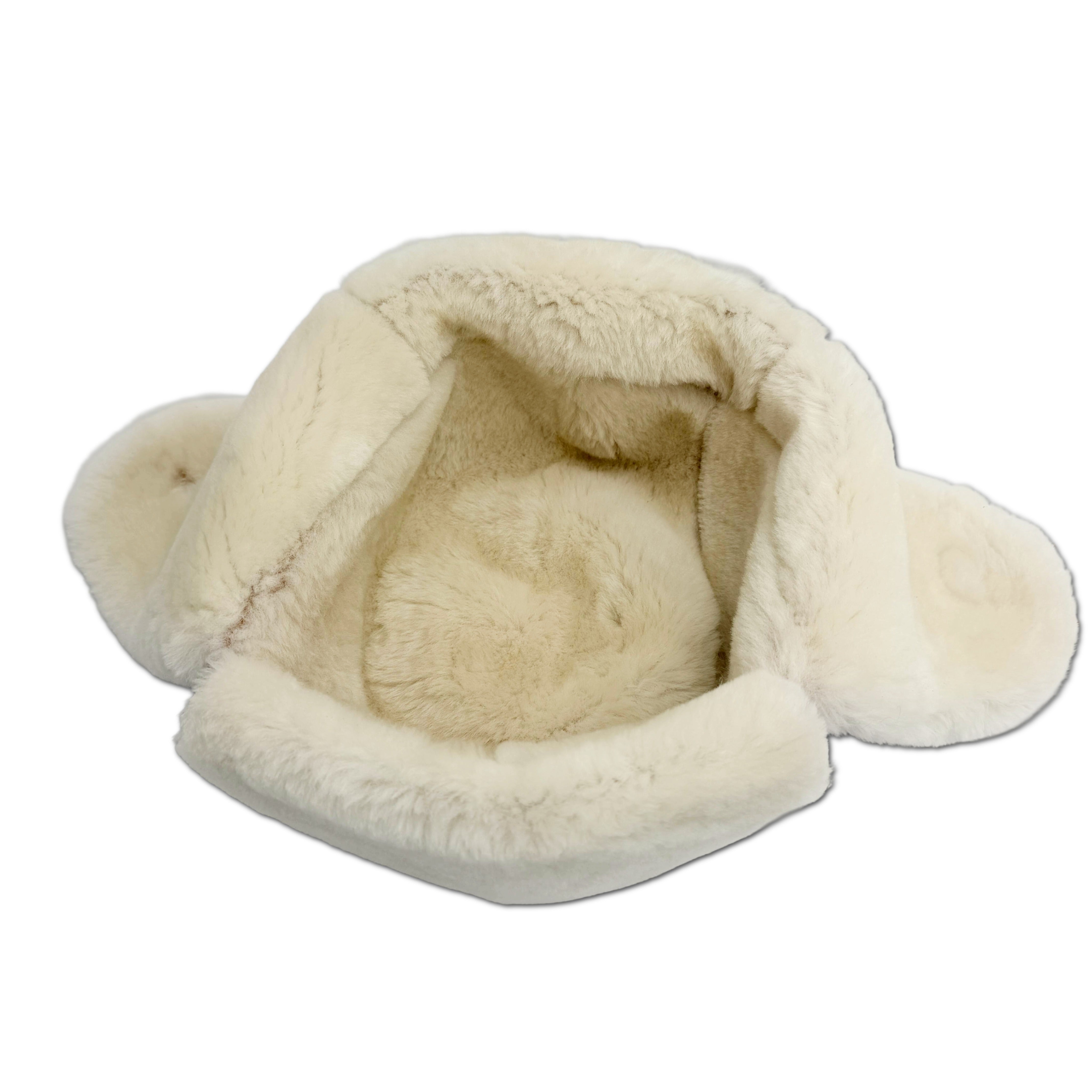 A brown suede aviator-style hat with thick white shearling lining on the ear flaps and crown- Yellow Earth