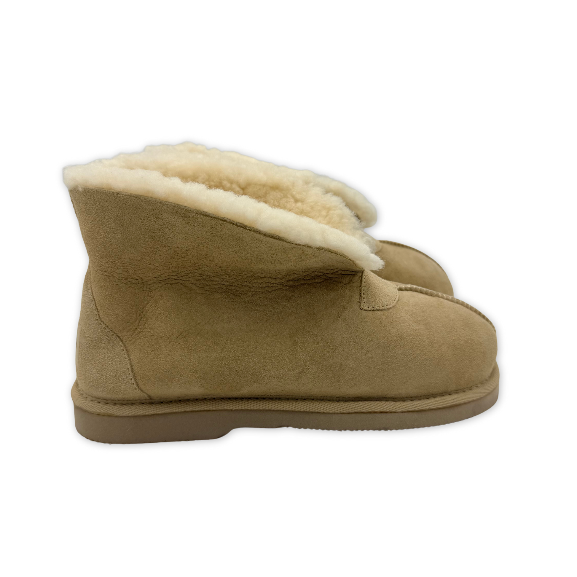 Beige sheepskin bootie slipper with cream wool lining, side view. - Yellow Earth Australia