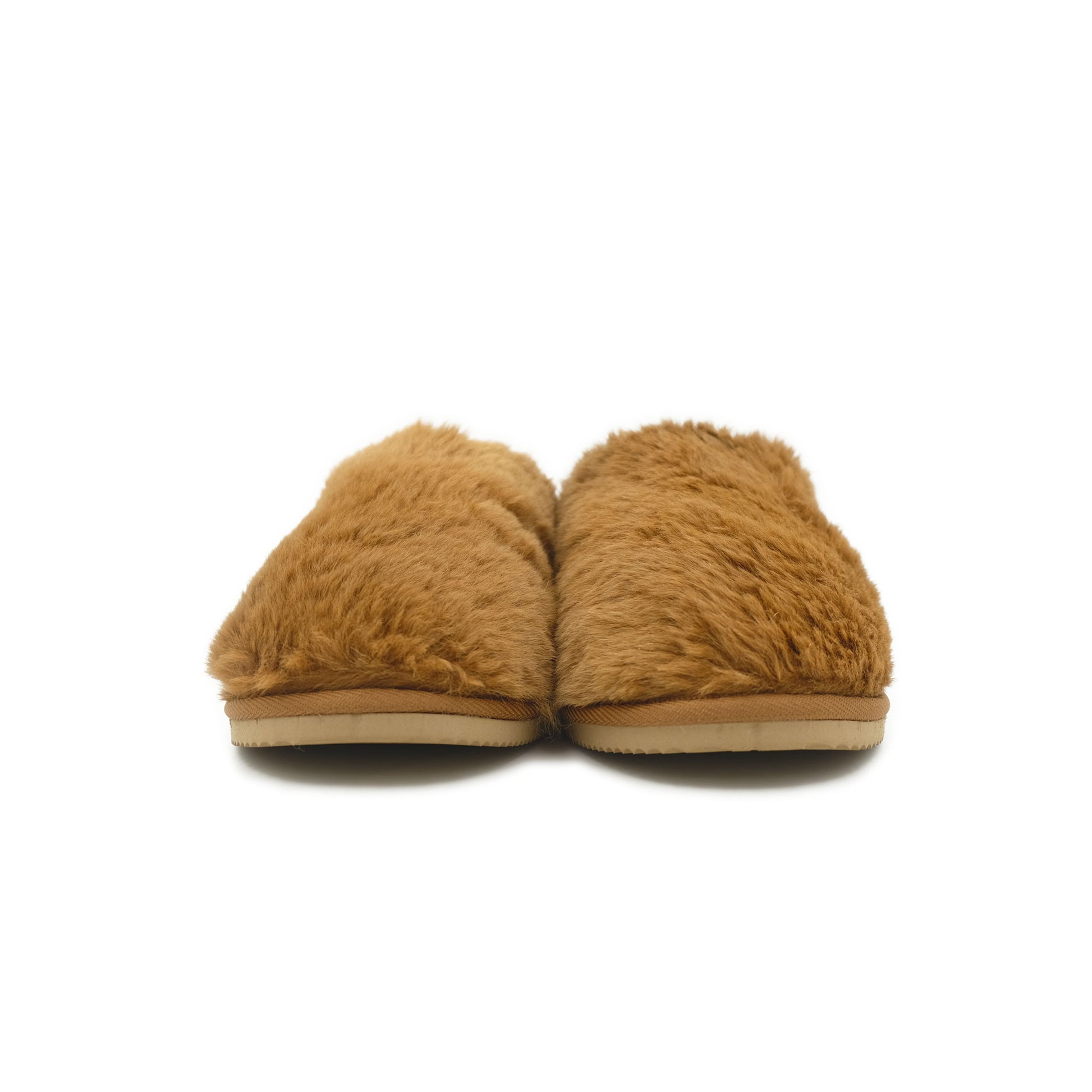 Pair of tan sheepskin slippers with fluffy wool upper and suede sole, front view. - Yellow Earth Australia