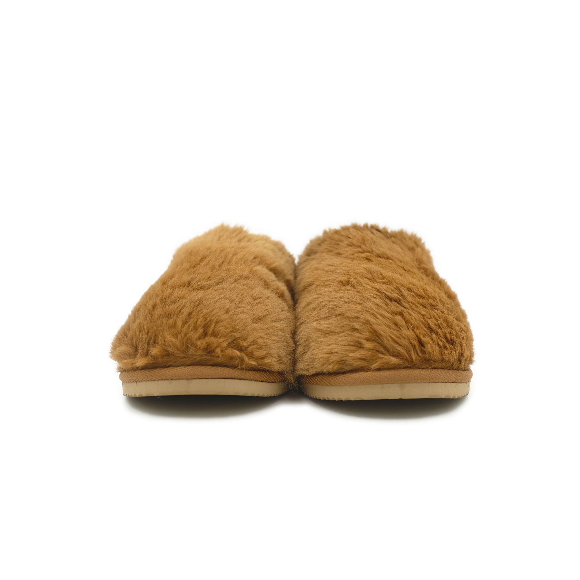Pair of tan sheepskin slippers with fluffy wool upper and suede sole, front view. - Yellow Earth Australia