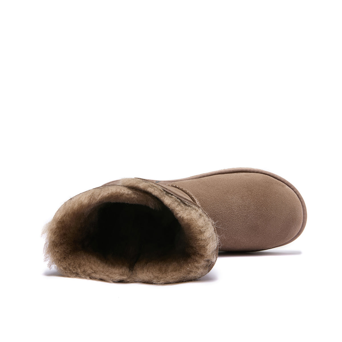 A single taupe-brown suede ankle boot with a thick, fluffy brown shearling lining, shown from a side profile view on a white background.