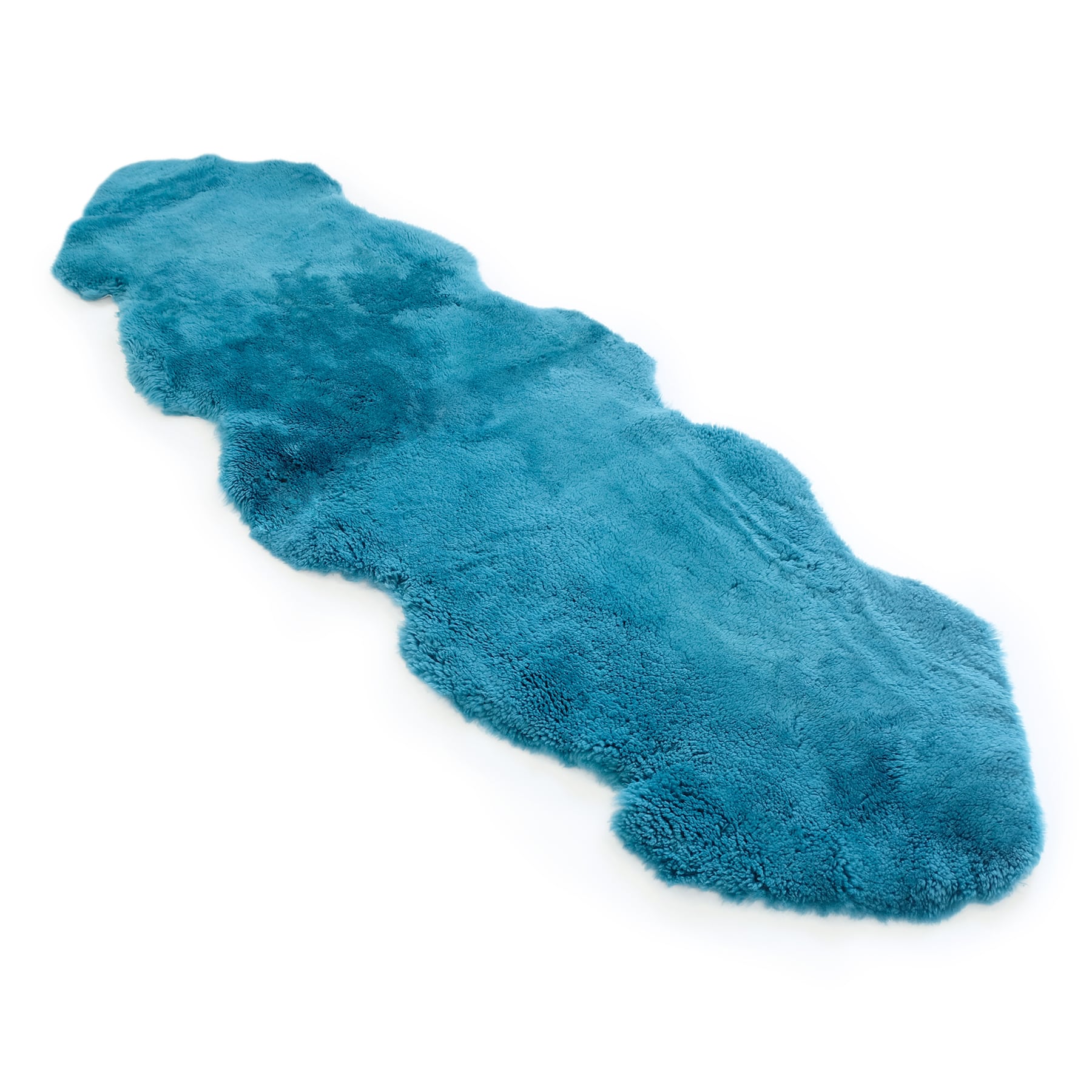 Turquoise sheepskin rug with soft wool pile displayed against white background. - Yellow Earth Australia