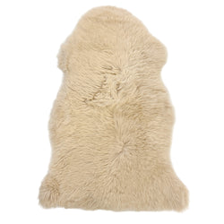 a photo of a sheepskin rug in the linen colour