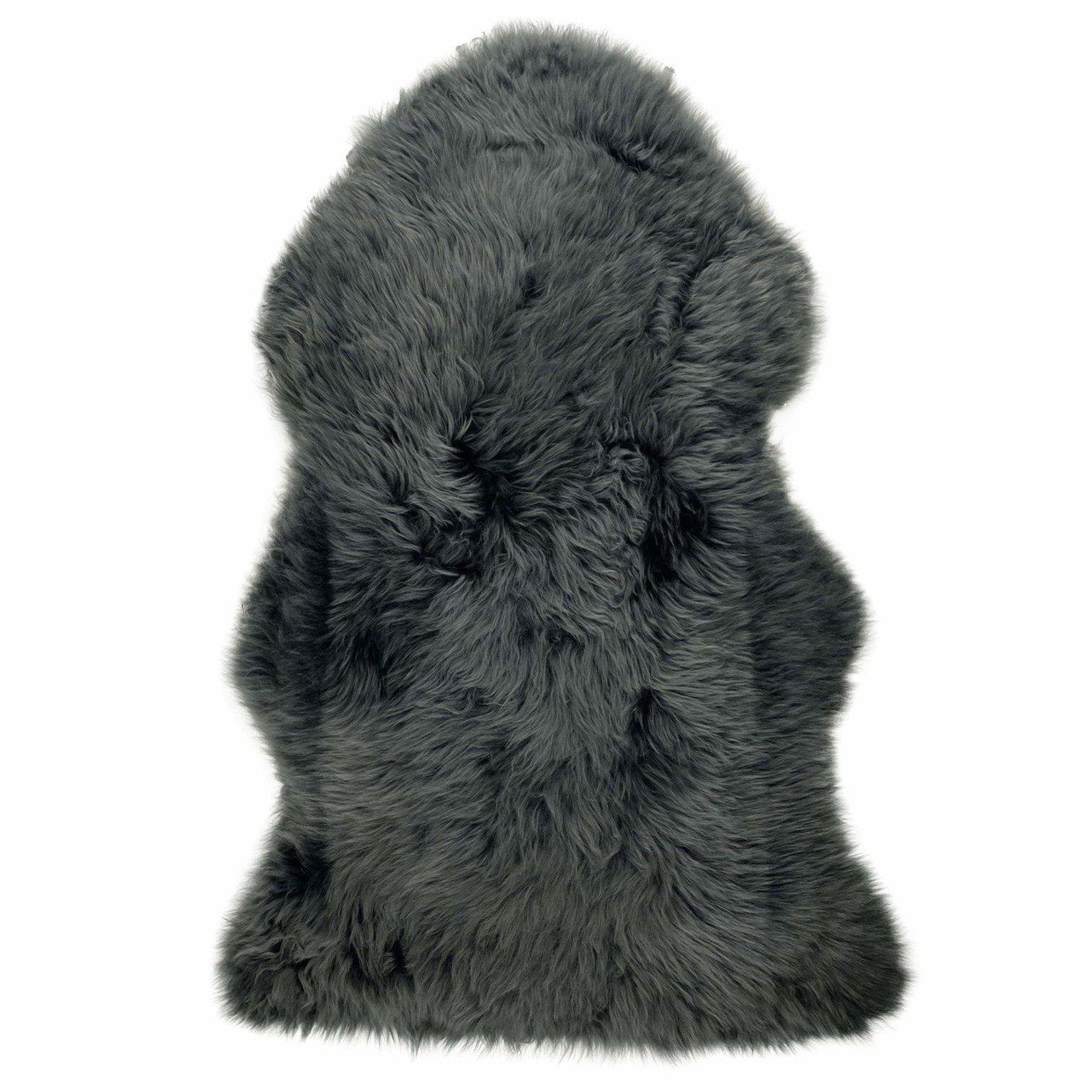 Grey sheepskin rug with thick wool pile viewed from above on white background. - Yellow Earth Australia