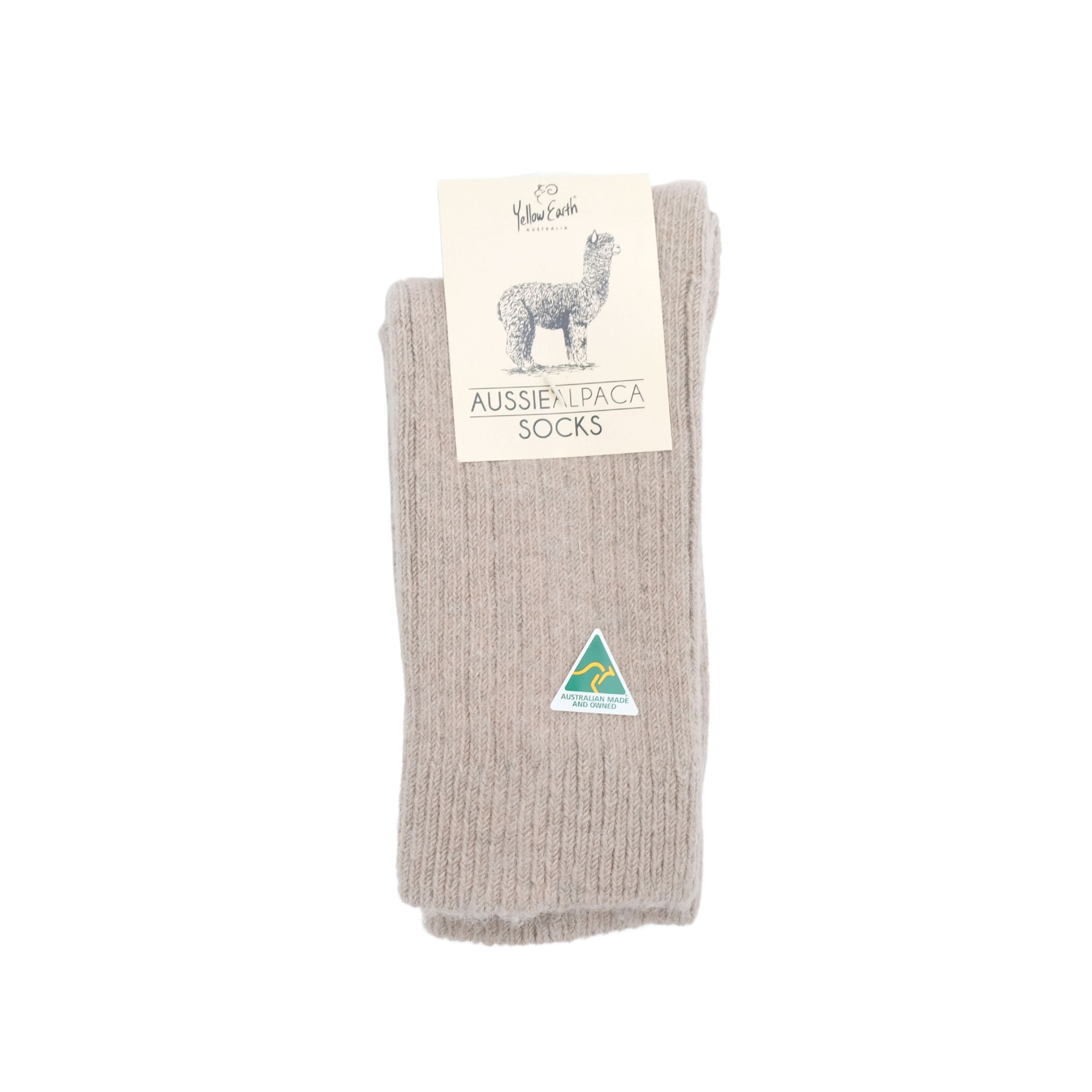 Beige ribbed alpaca wool socks displayed flat with product label visible. - Yellow Earth Australia