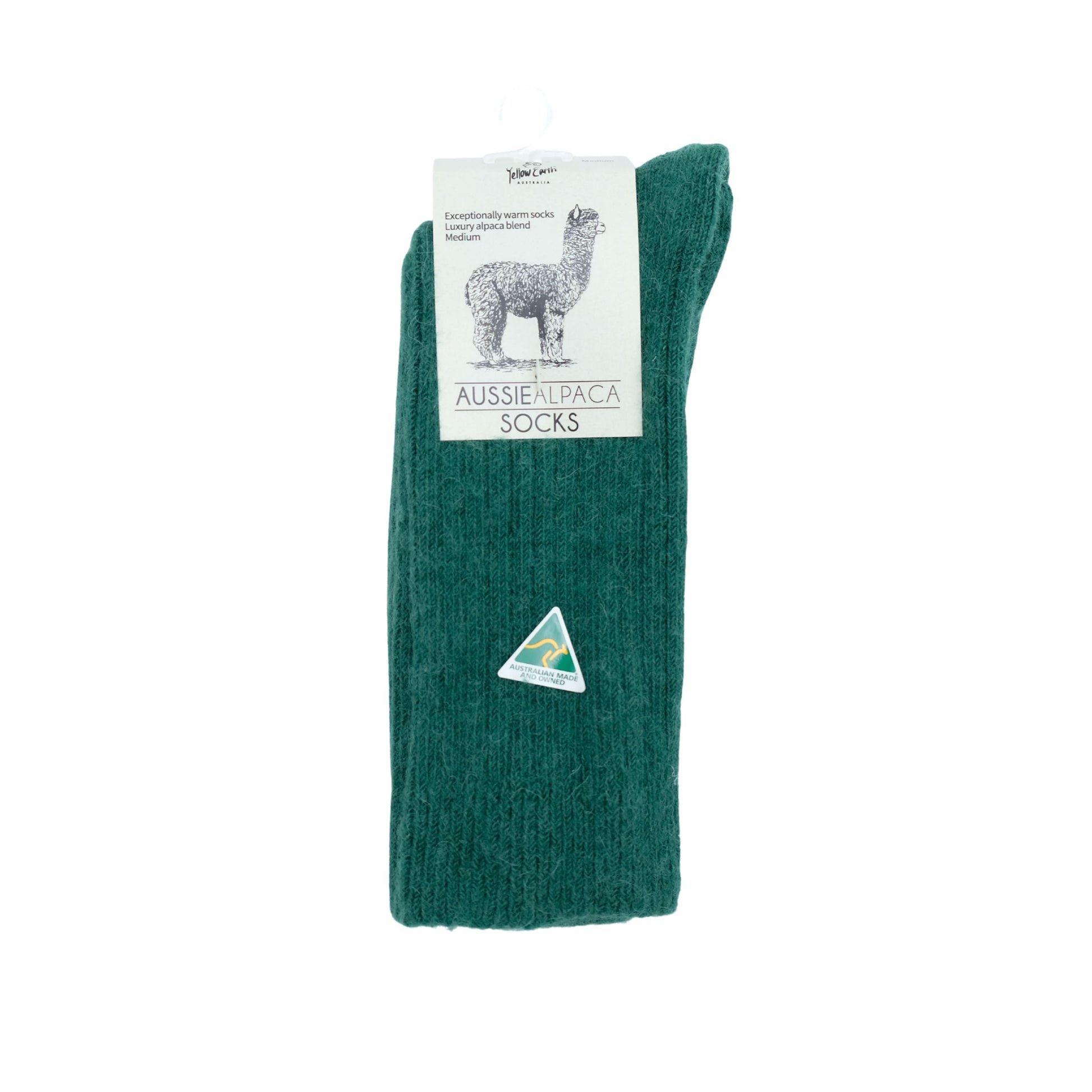Green alpaca blend socks rolled display showing ribbed knit texture and care label. - Yellow Earth Australia