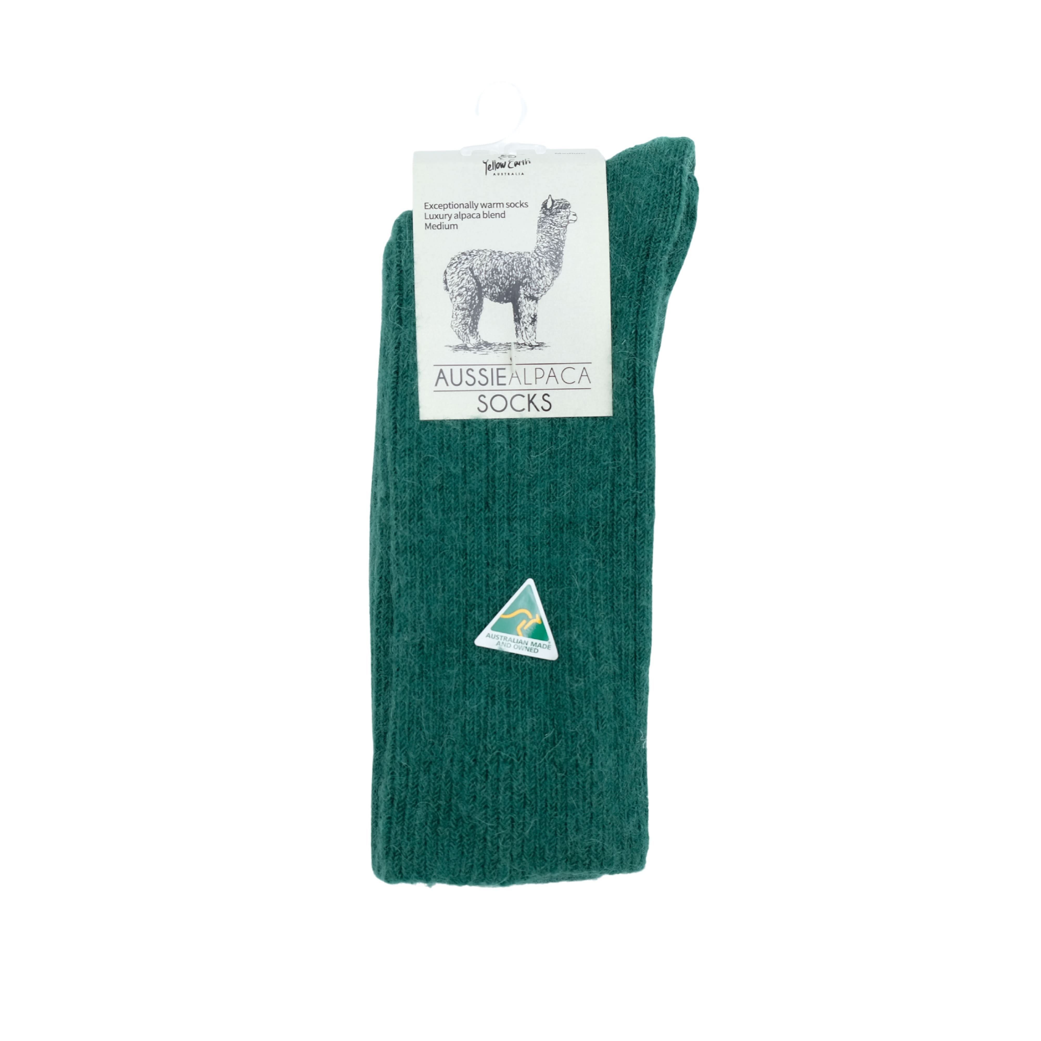 Green alpaca blend socks rolled display showing ribbed knit texture and care label. - Yellow Earth Australia