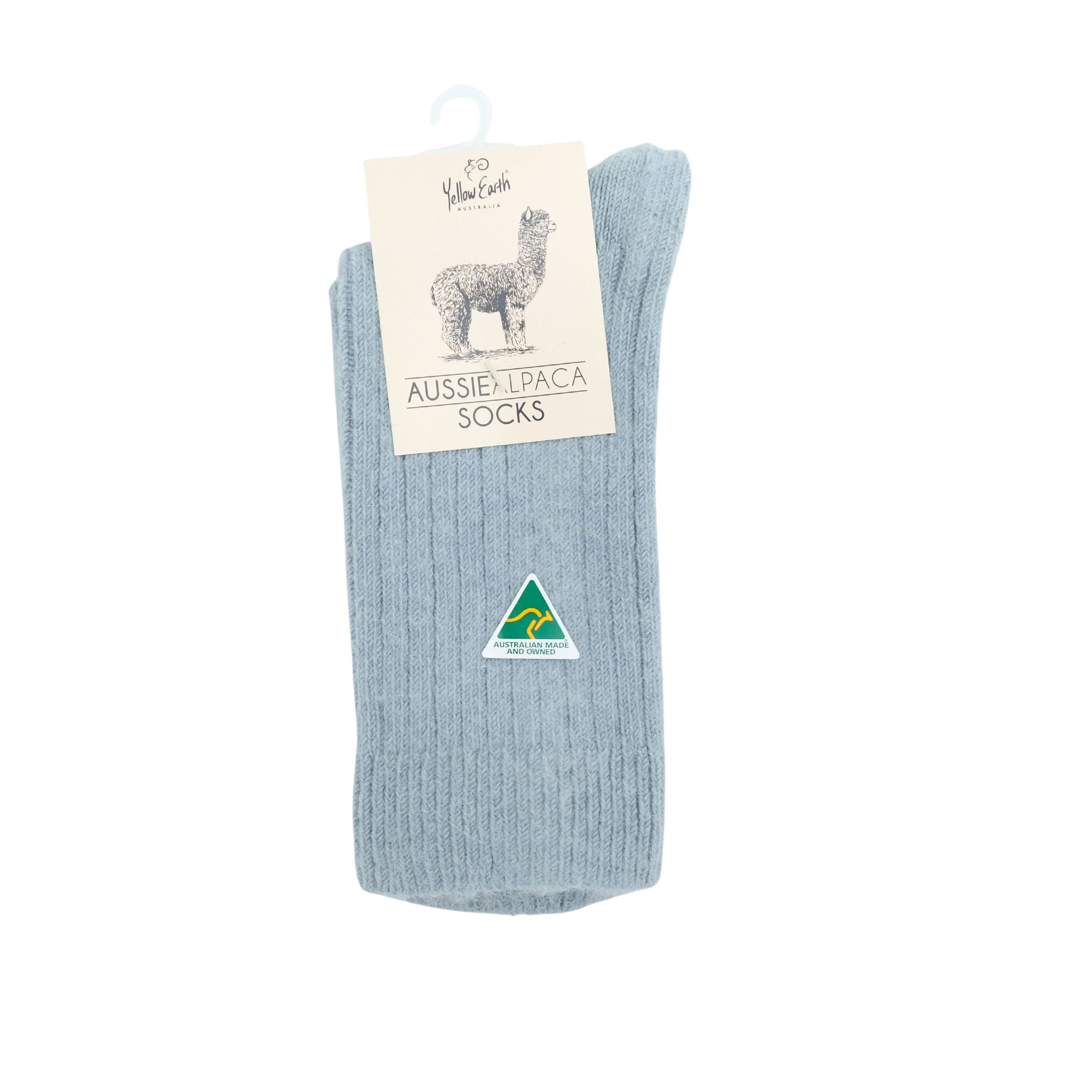 Light blue ribbed alpaca wool socks displayed on hanger showing front view. - Yellow Earth Australia