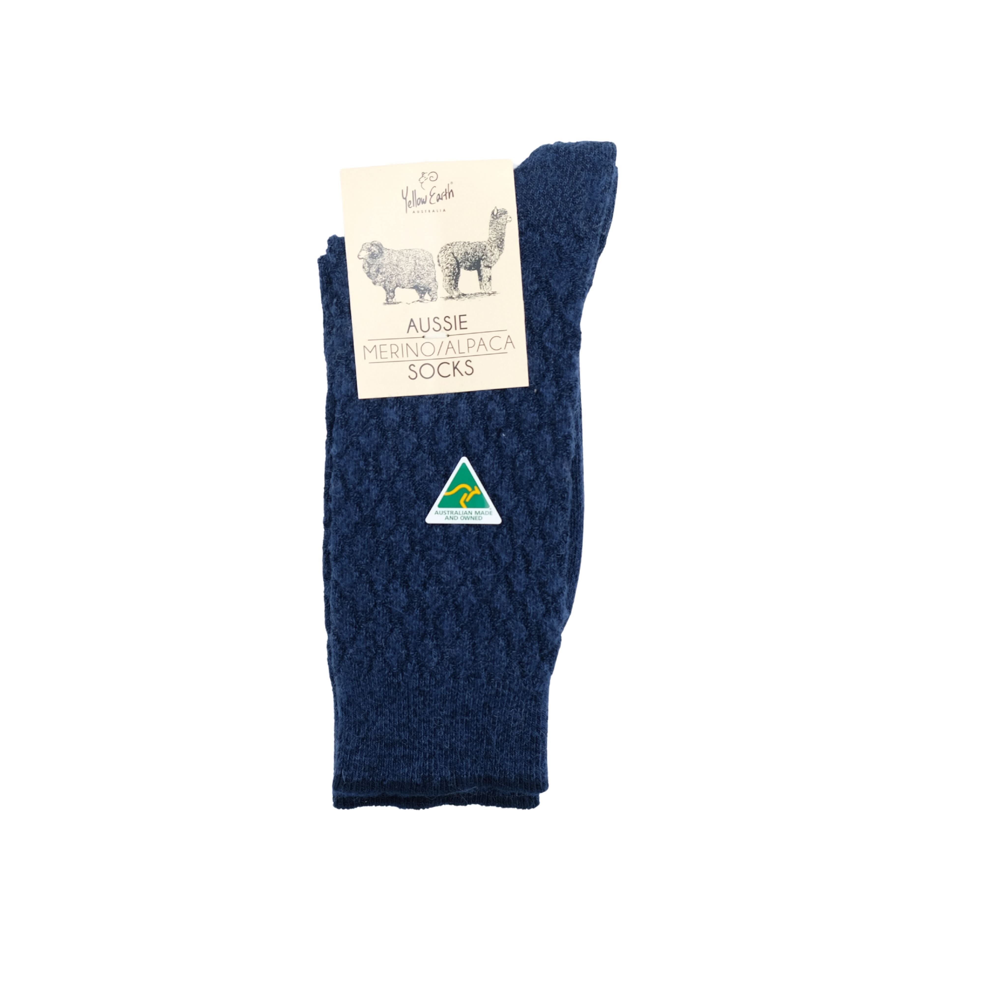 Navy merino and alpaca wool socks displayed flat with product label visible. - Yellow Earth Australia
