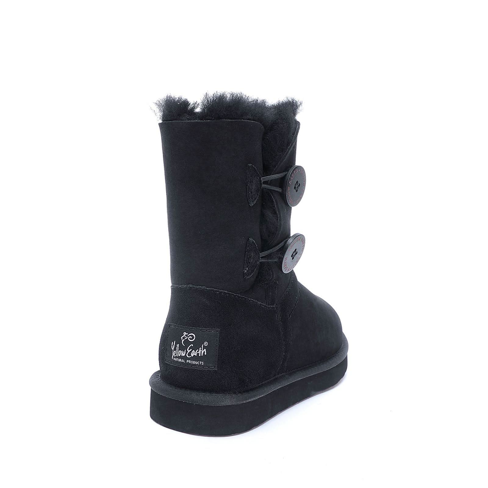 Black sheepskin mid-calf boot with button details and fluffy wool lining, rear view. - Yellow Earth Australia