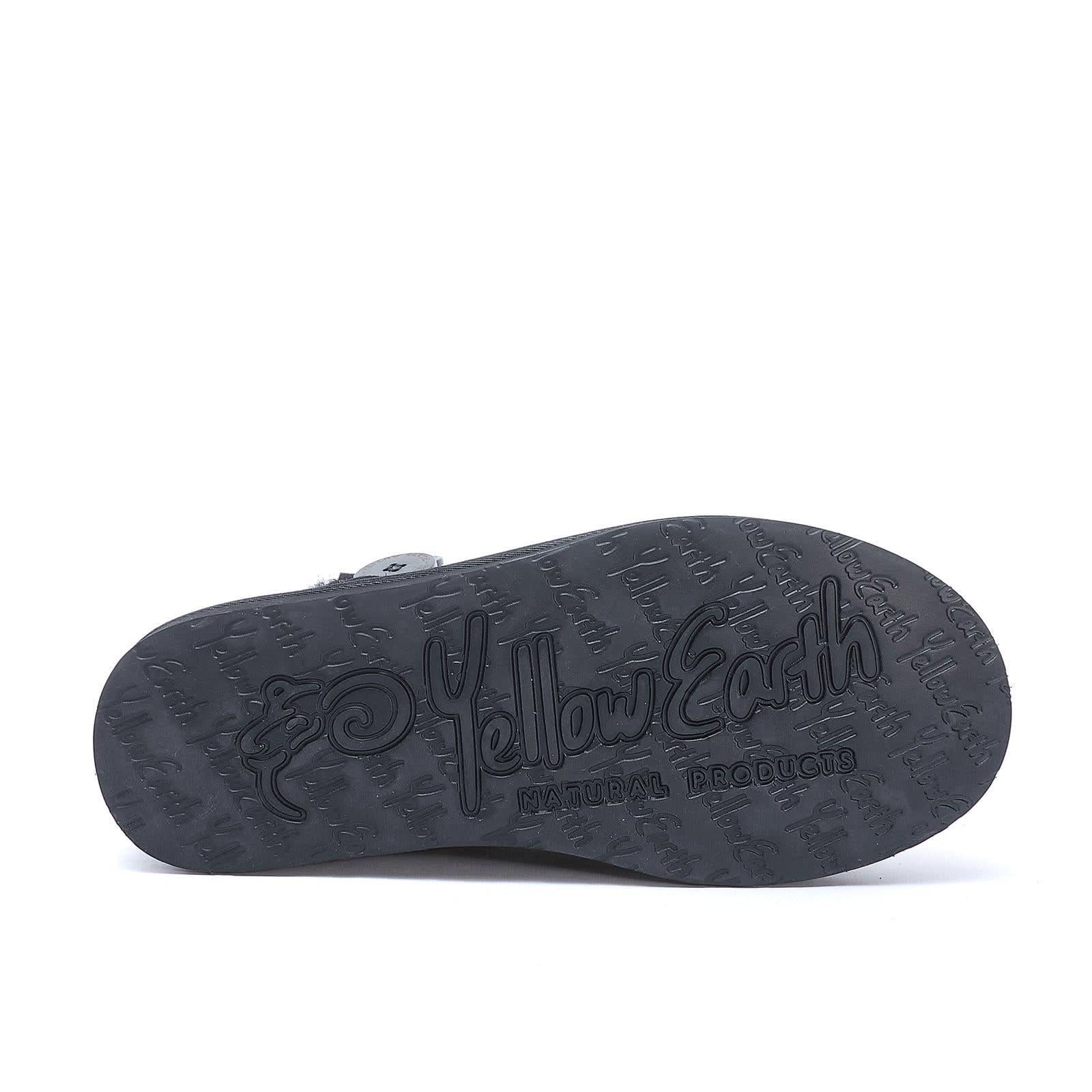 Black sheepskin slipper sole view showing natural products textured rubber outsole. - Yellow Earth Australia
