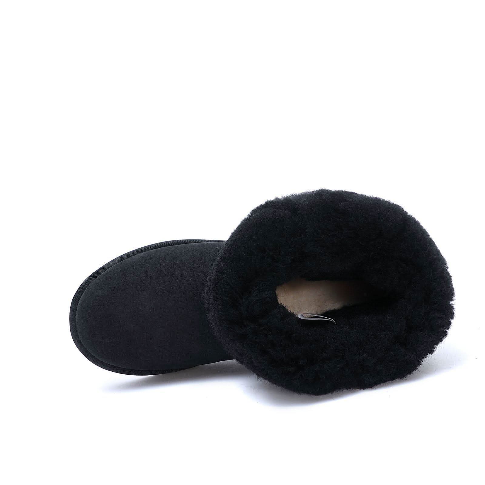 Black sheepskin boot with fluffy wool lining, side view on white background. - Yellow Earth Australia