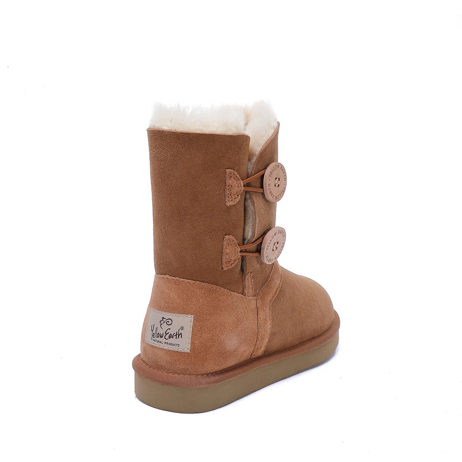 Tan sheepskin boot with wool lining and decorative button details, rear view. - Yellow Earth Australia