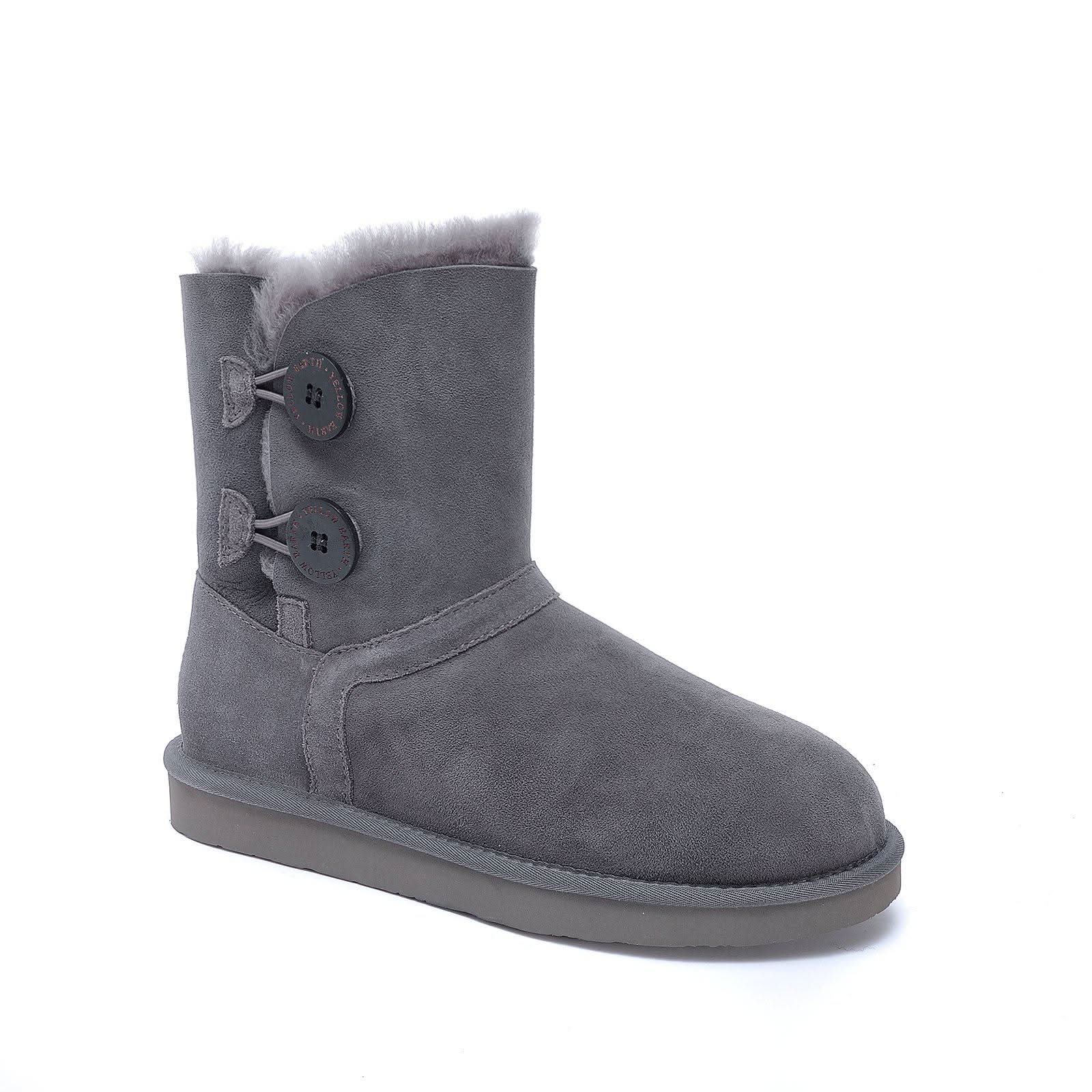 Grey sheepskin boot with button detail and fluffy wool lining, side view. - Yellow Earth Australia