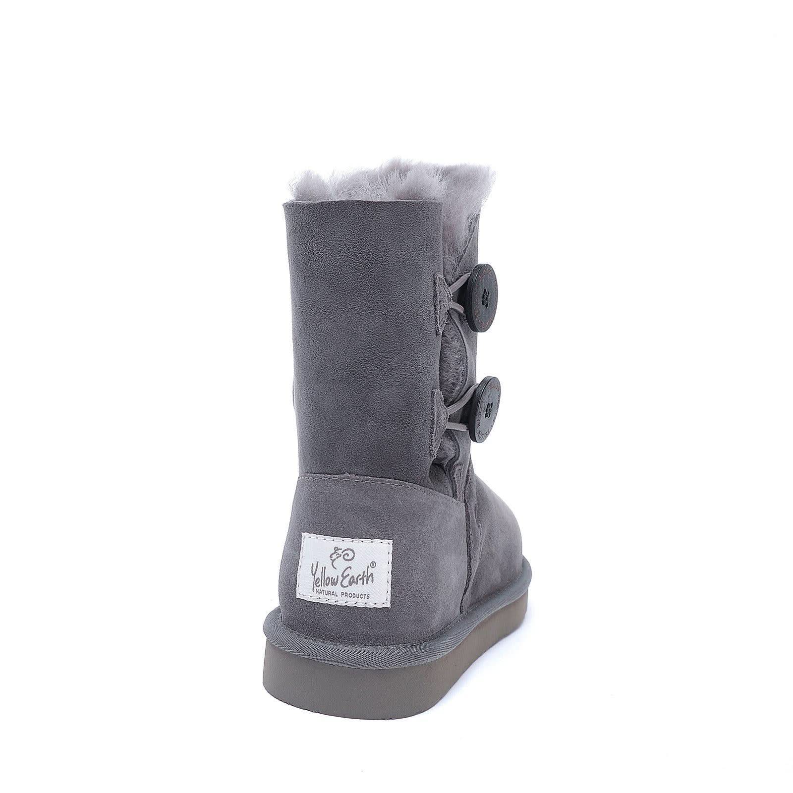 Grey sheepskin boot with fur lining and button detail, side view. - Yellow Earth Australia