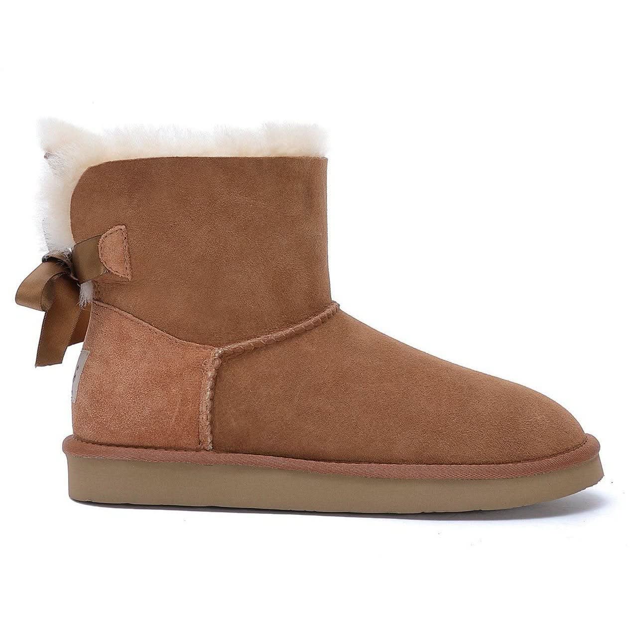 Chestnut sheepskin ankle boot with wool collar and ribbon bow, side view. - Yellow Earth Australia